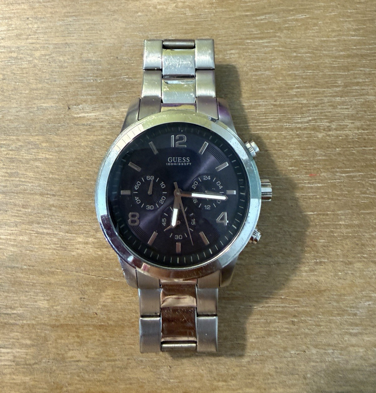 GUESS Men’s Silver Stainless Steel Watch. Needs a battery