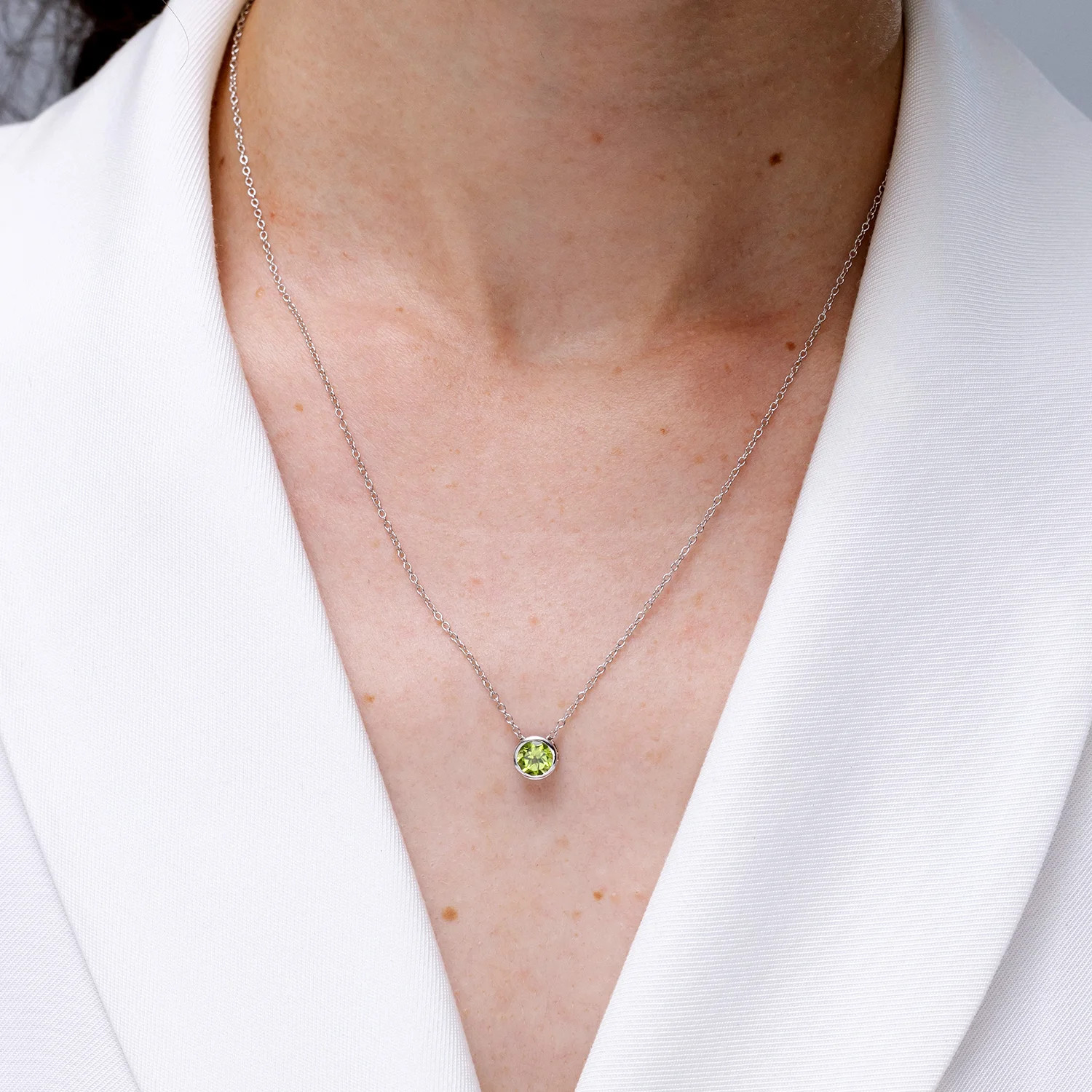 Angara Natural Bezel-Set Round 1.4 ct Peridot Solitaire Pendant in Silver