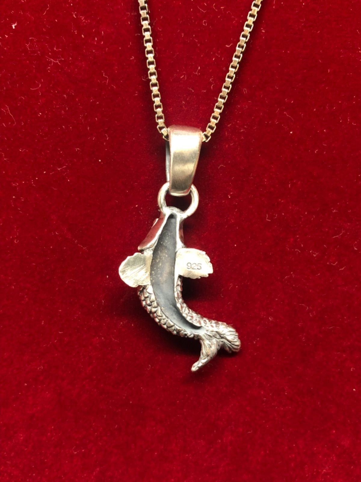 Ascending koi pendant top