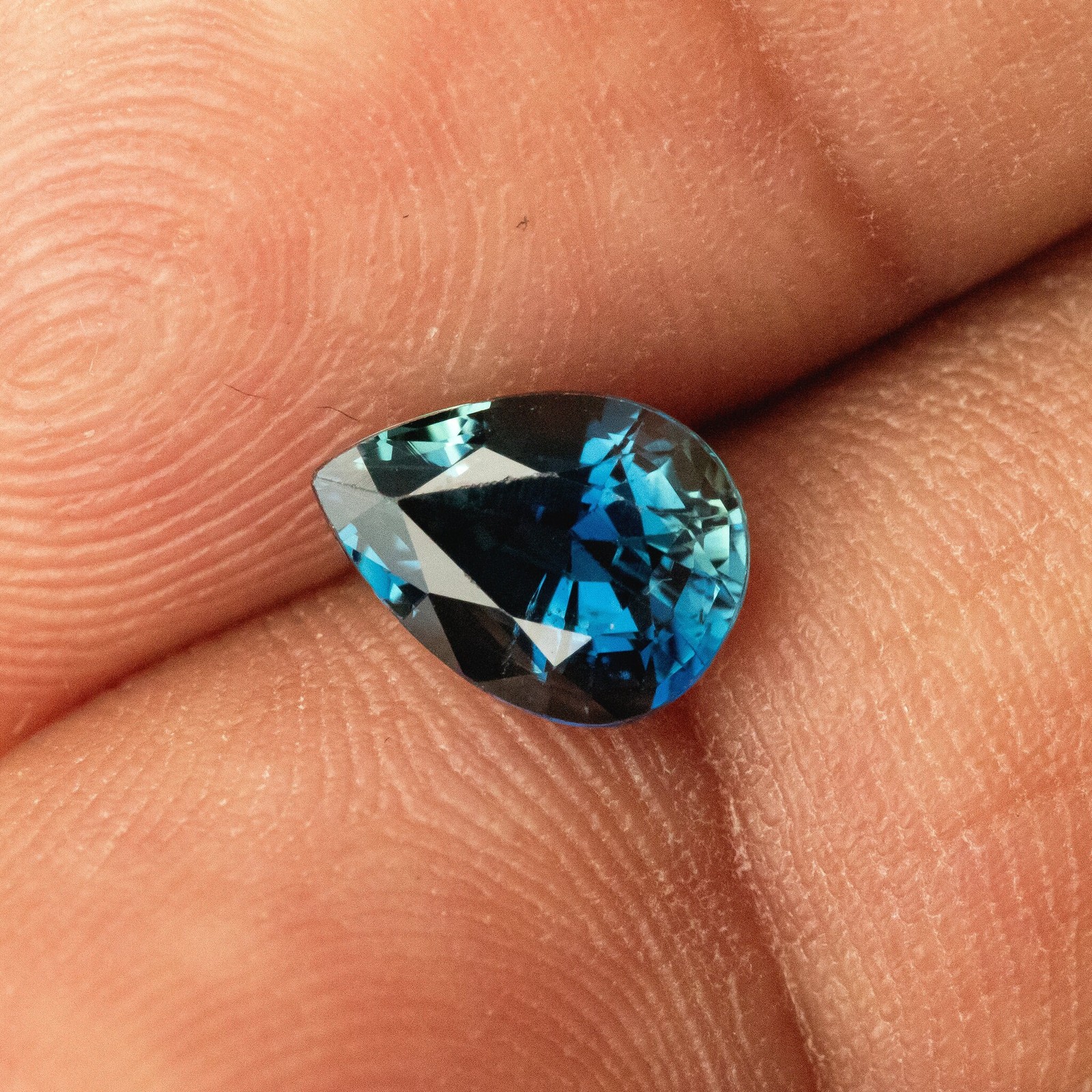 1.35ct Pear Shape Heated Natural Sapphire in Teal Green Peacock Blue Color