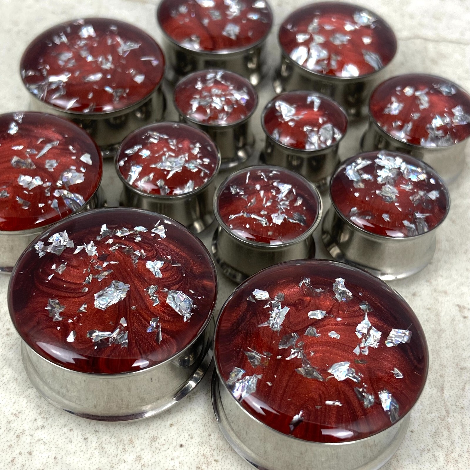 Stainless Steel Plugs with Embedded Red Pearlescent Resin Silver Flakes gauges