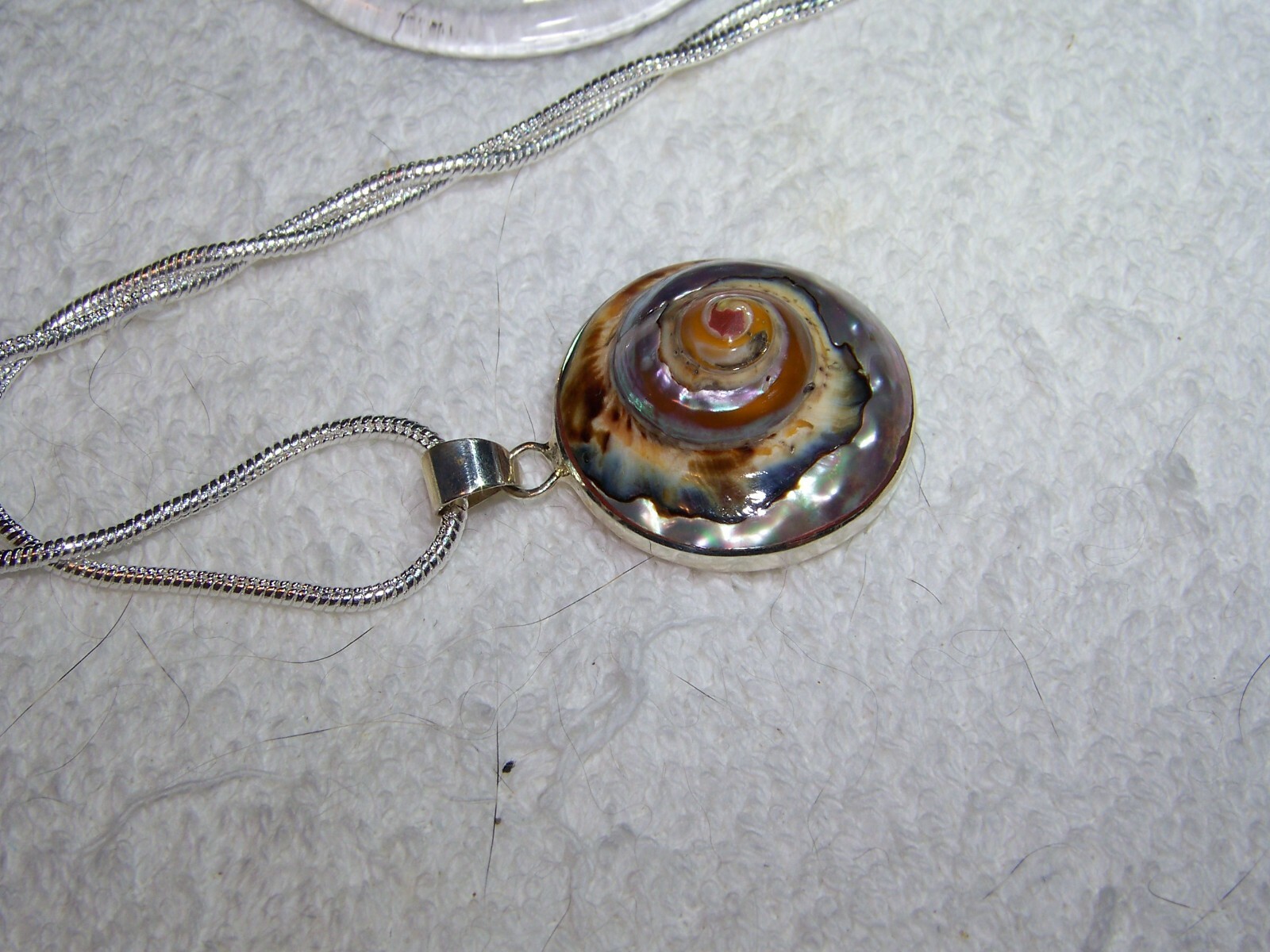 Sterling Silver African Turban shell on 2mm 16-30 inch sterling necklace.