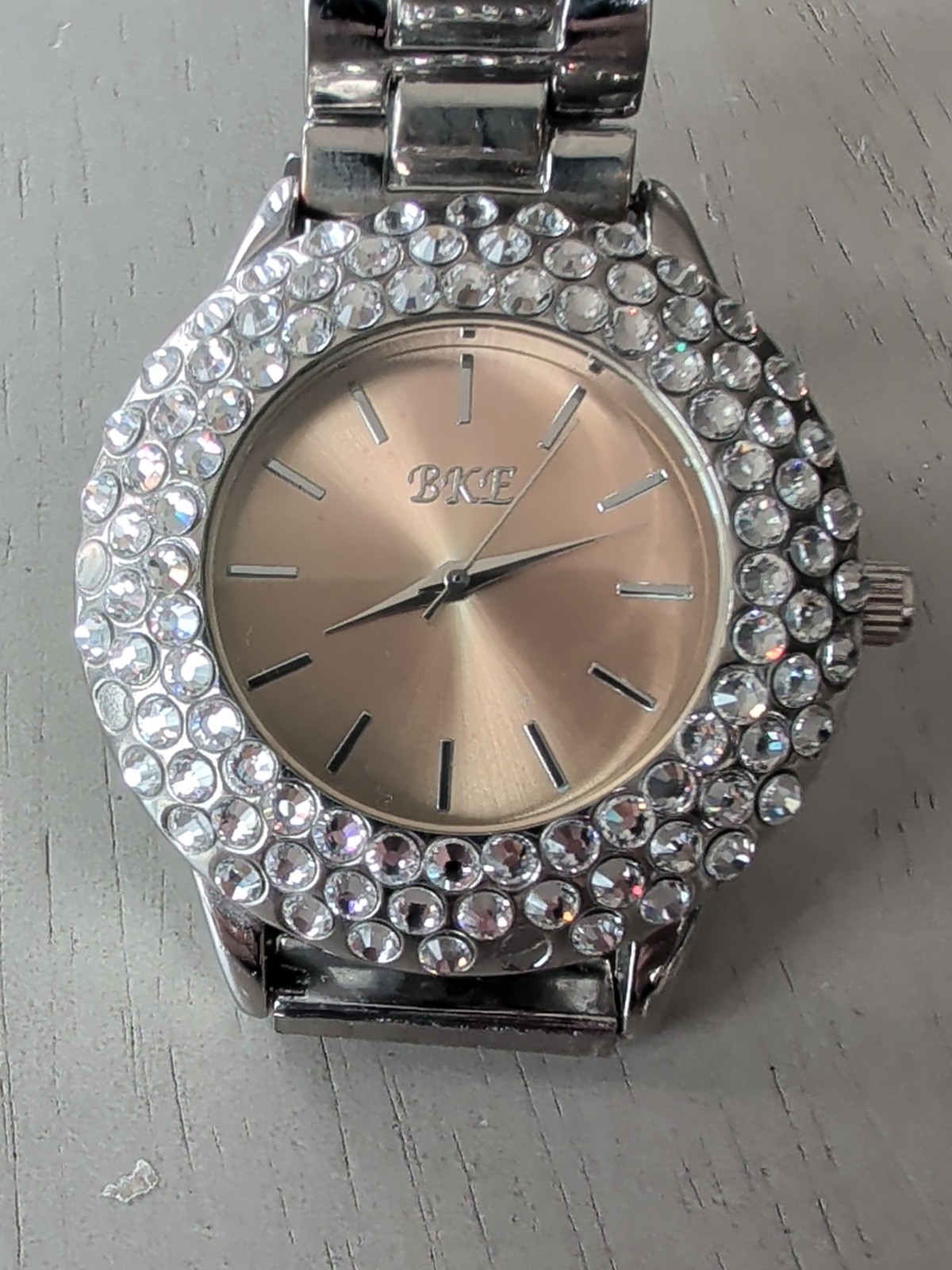 BKE Buckle Watch Women’s ROSE Tone Crystal Accent Bling New battery 6.5″ Band