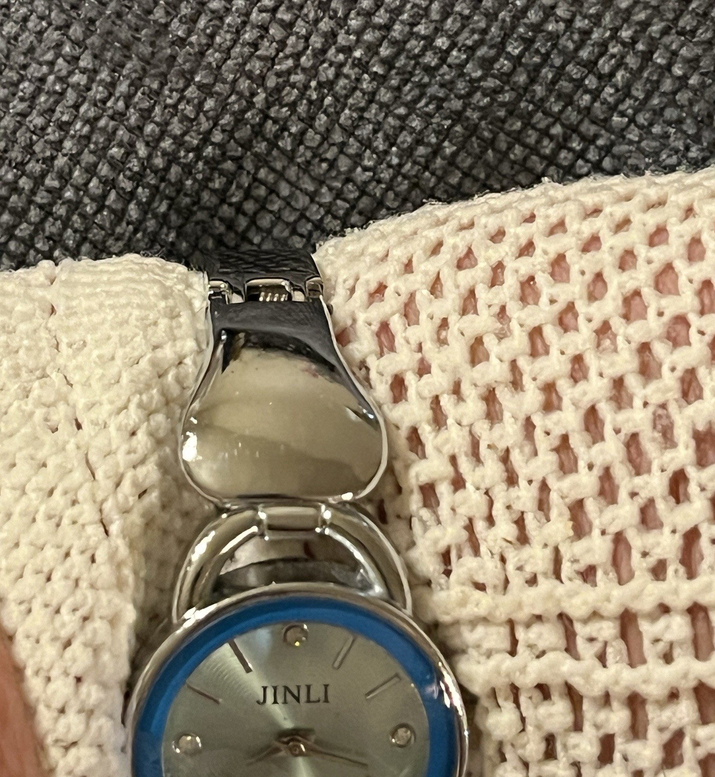 JINLI Women’s Quartz Analog Silver Tone Bracelet Watch w/ Blue Fixed Bezel