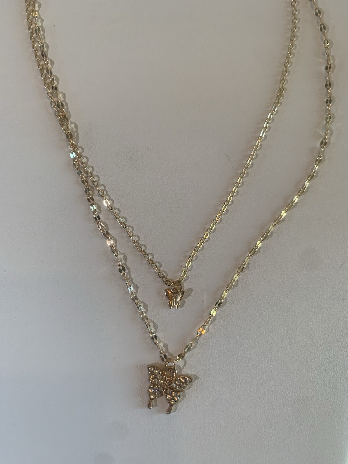 Gold Tone Layered Butterfly Charm Necklace with Clear Crystal Pendant, 16.14″
