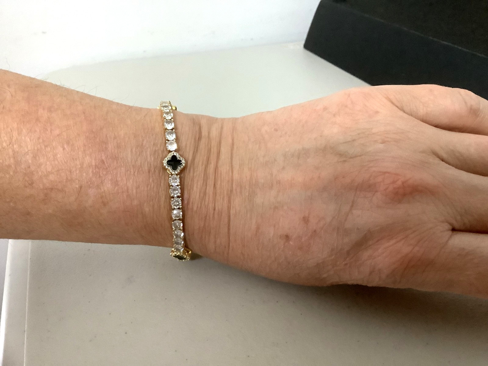 Imperium 18k gold plated CZs four leaf clover black enamel tennis bracelet 7″