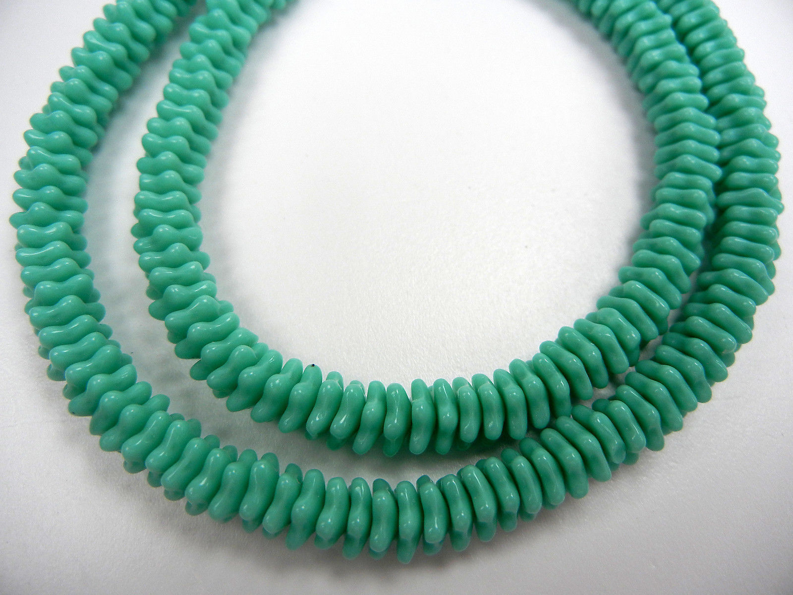 192 Czech glass flat flower star bead cups 7x3mm Opaque Green, 16 inch strand