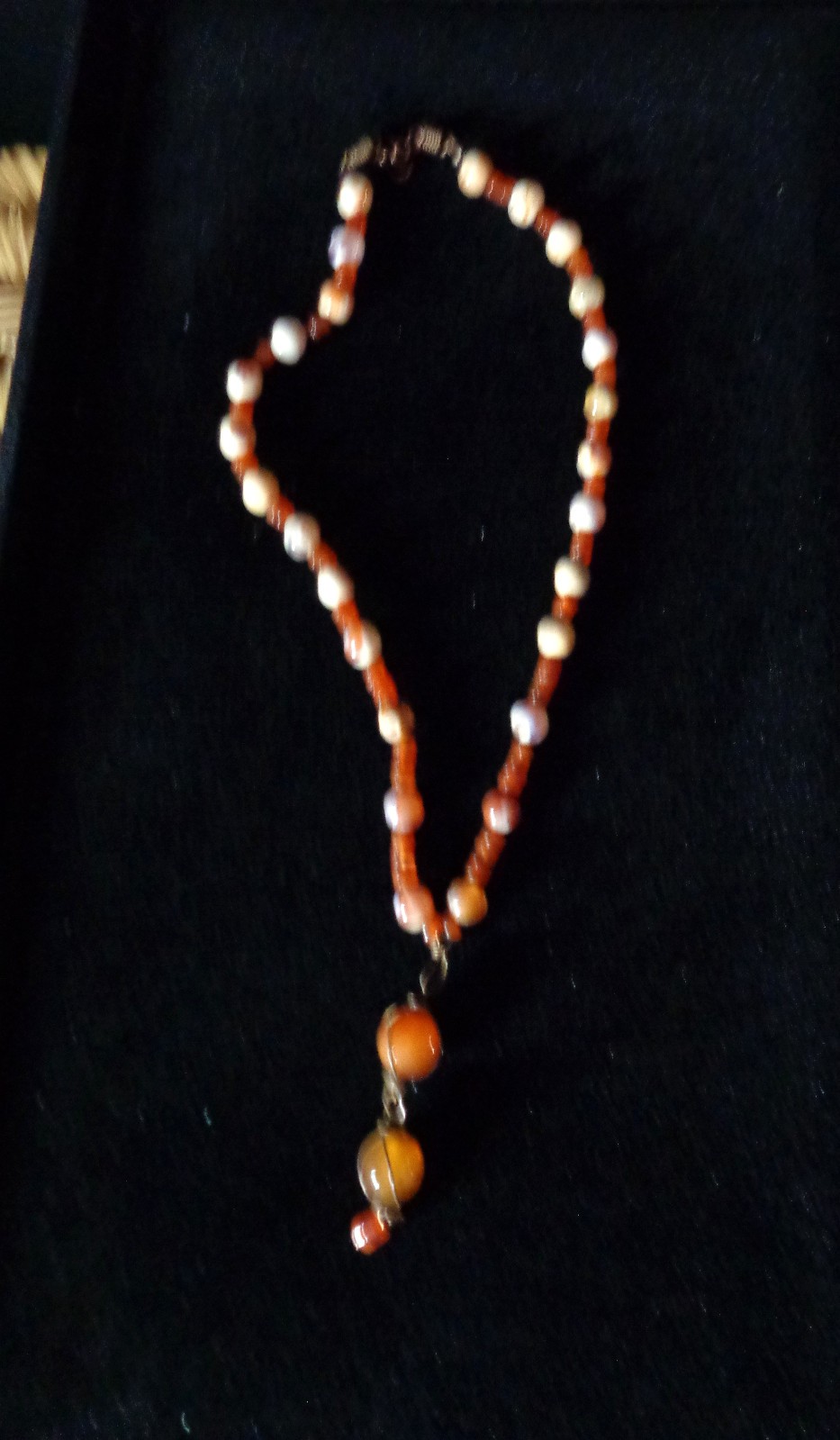 Artisan crafted,3” caged faceted red agate and carnelian pendant, on 18” hand kn