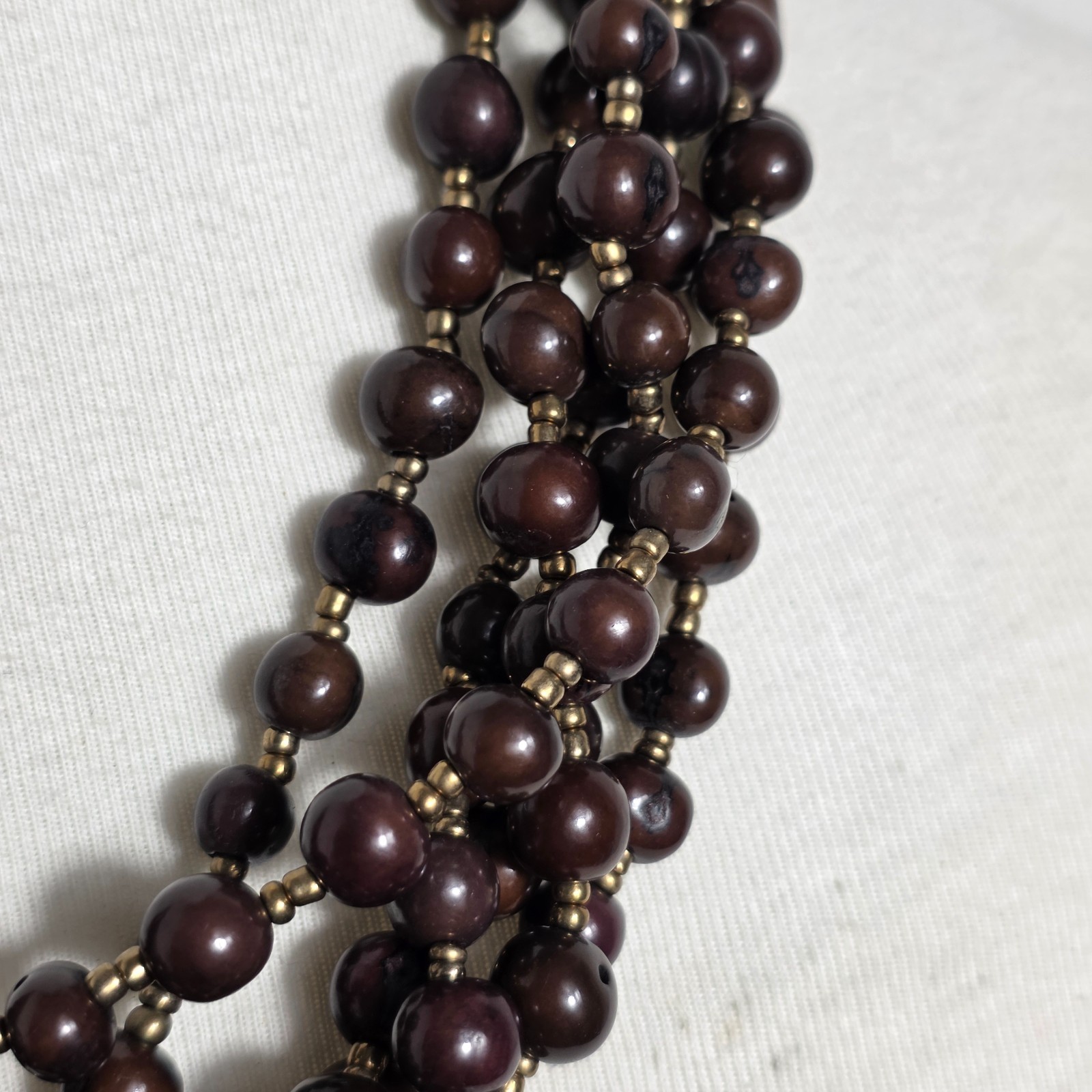 Multi-Strand Brown Acai Seed Bead Necklace with Gold Seed Bead Spacers