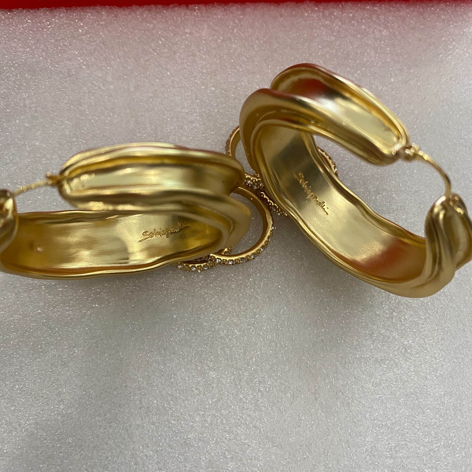 Schiaparelli Asymmetrical Twisted Gold Hoop Earrings With Pave Crystal Rings