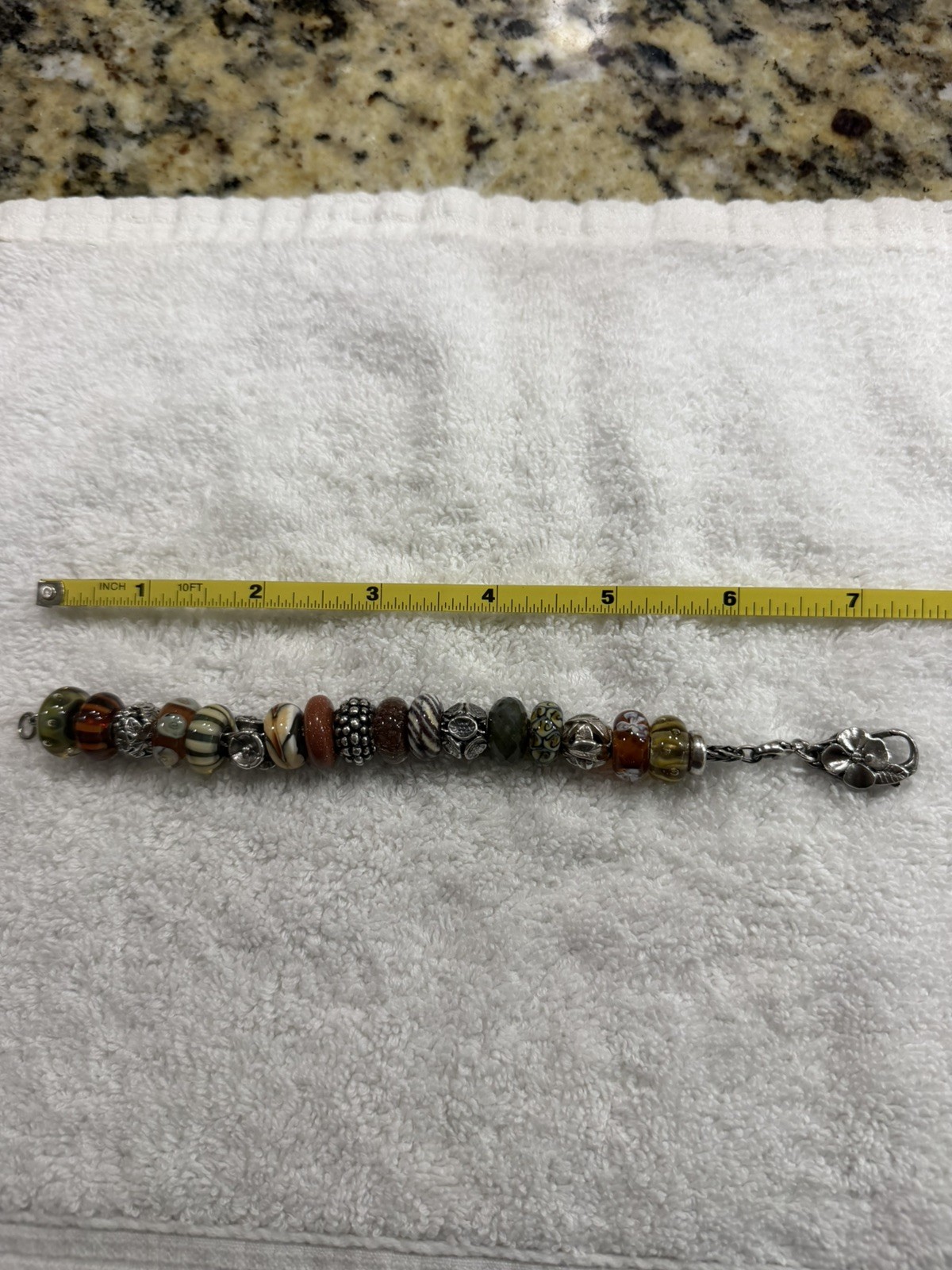 Trollbeads SS 7.5 inch Charm Bracelet with 17 Retired Charms in Browns & Tans