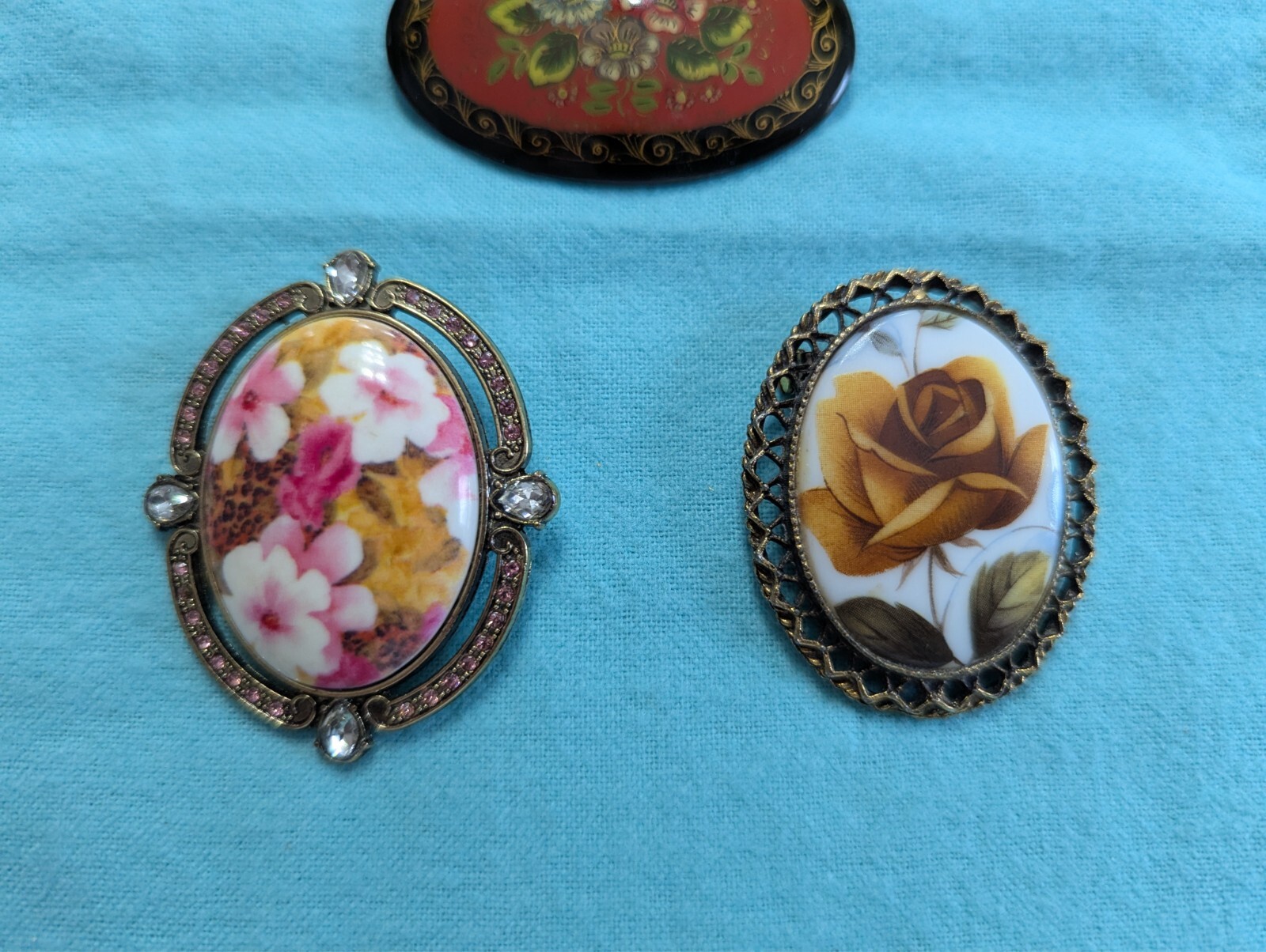 LOT/3 diff OVAL BROOCH/PINS w/diff FLORAL DESIGNS 2 Metals/1 RUSSIAN Black Wood