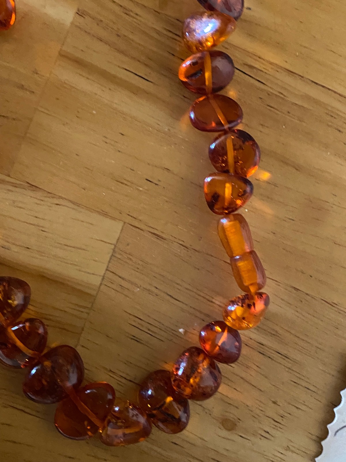 Braun amber necklace 21″ long with amber lock. New. Latvia.
