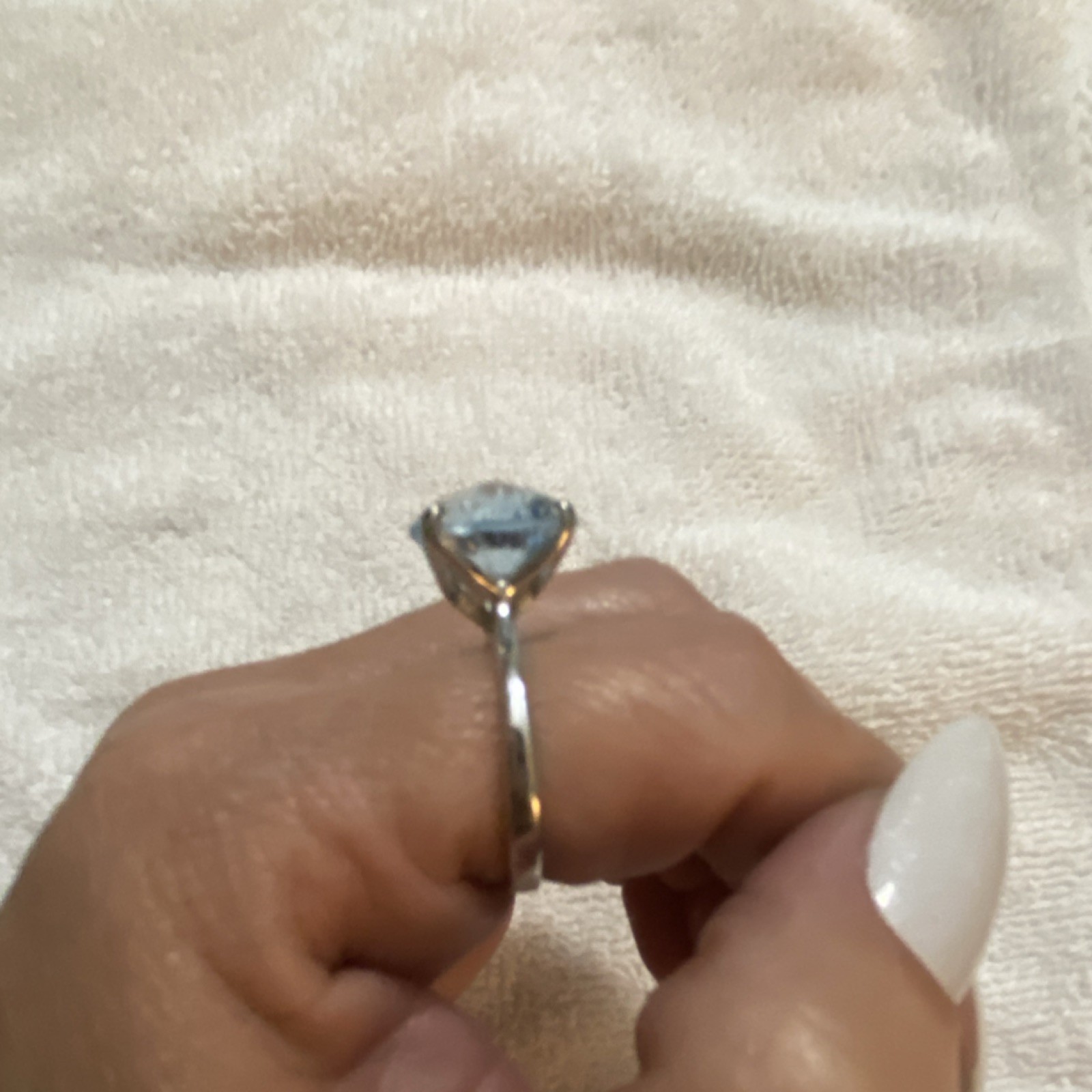 Round blue topaz petal prong, silver tone size 7