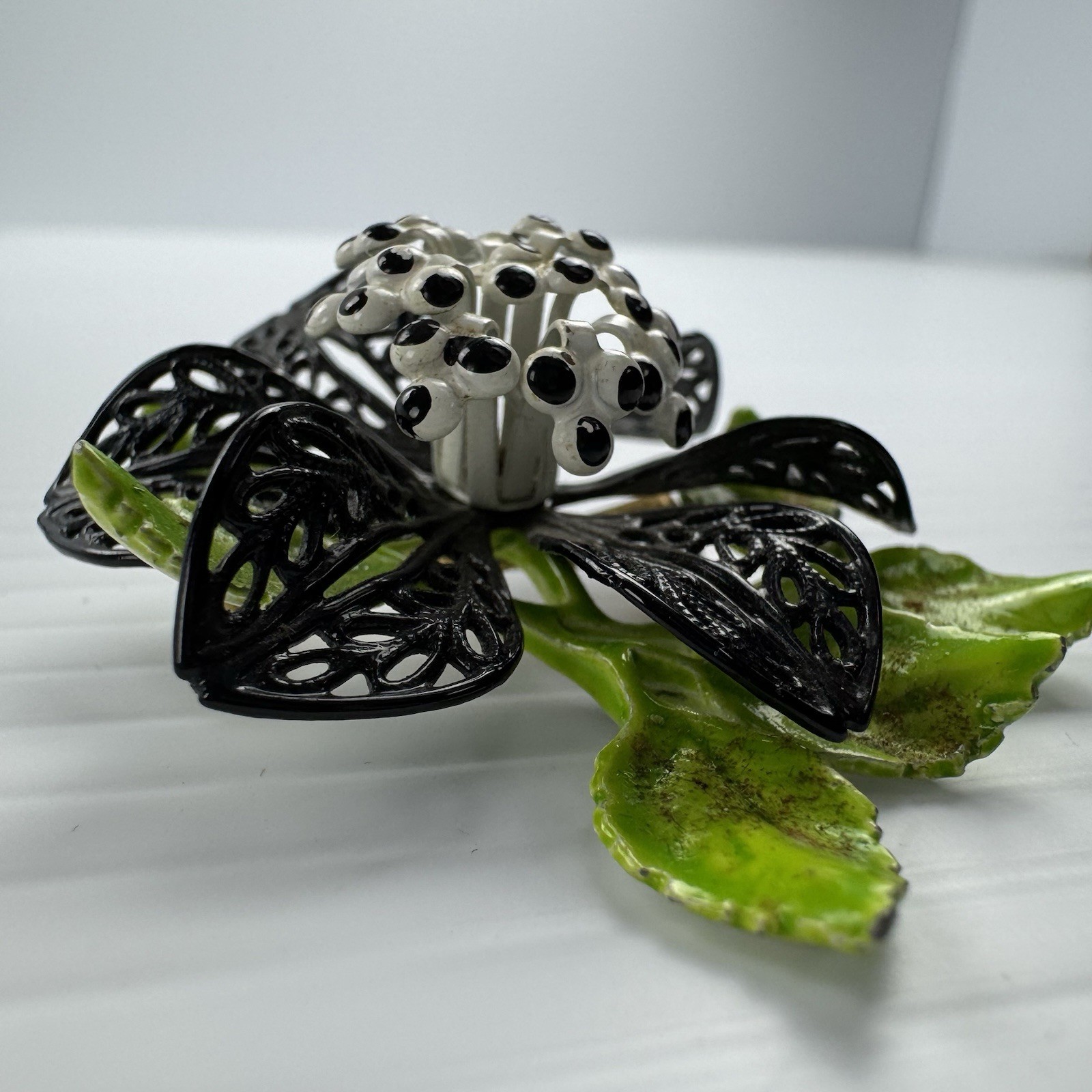 Vintage Enamel Flower Brooch Black White Green Filigree Leaf Statement Pin