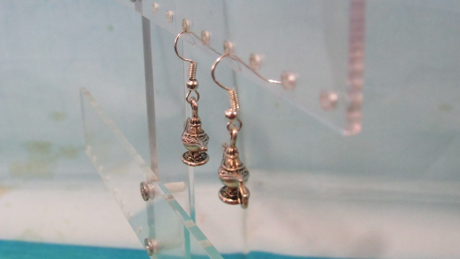 Silver Hook Earrings with a Dangling Silver Tone Genie Lamp