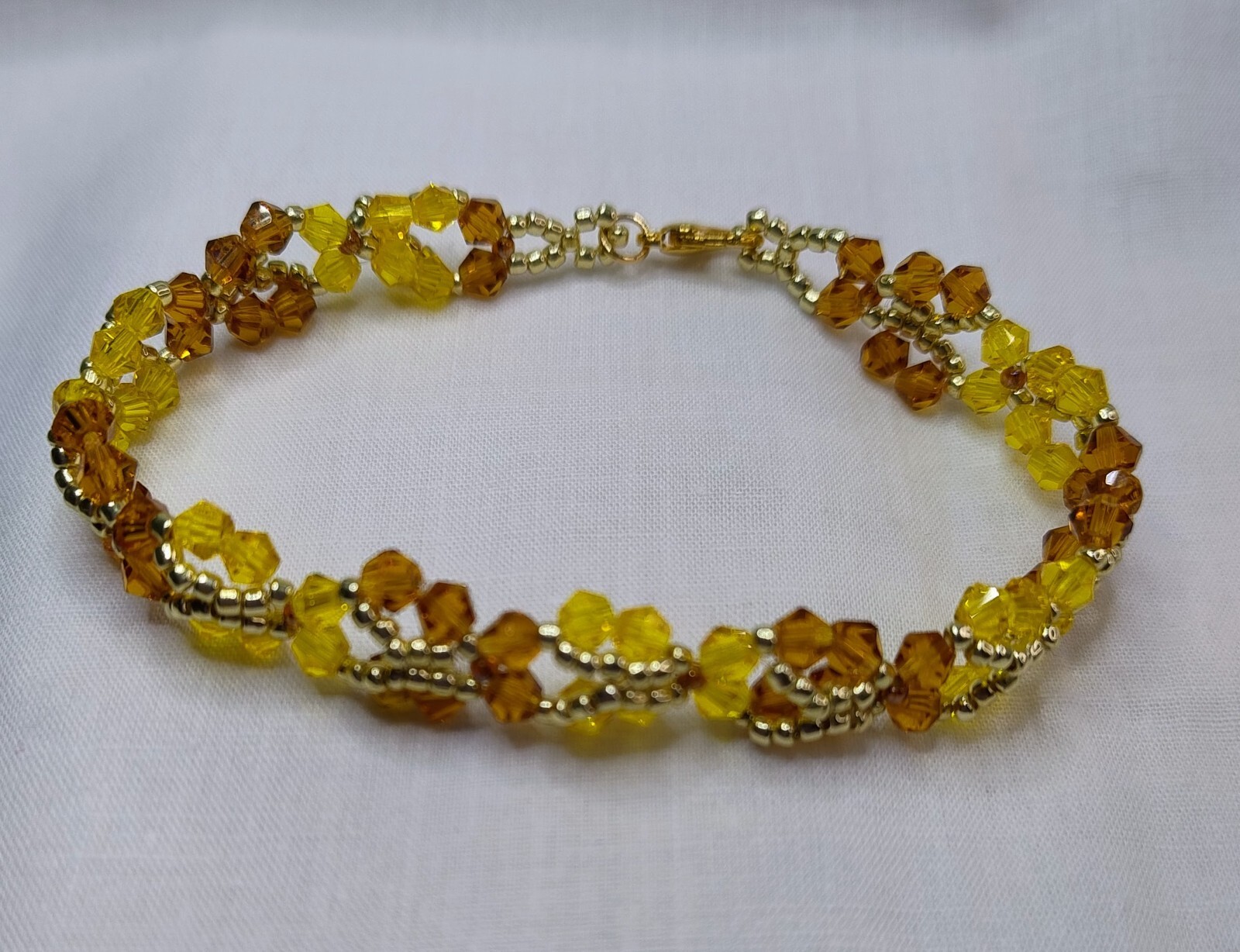 Handmade Beautiful Butterfly design bracelet in Honey, Yellow and Gold Colours