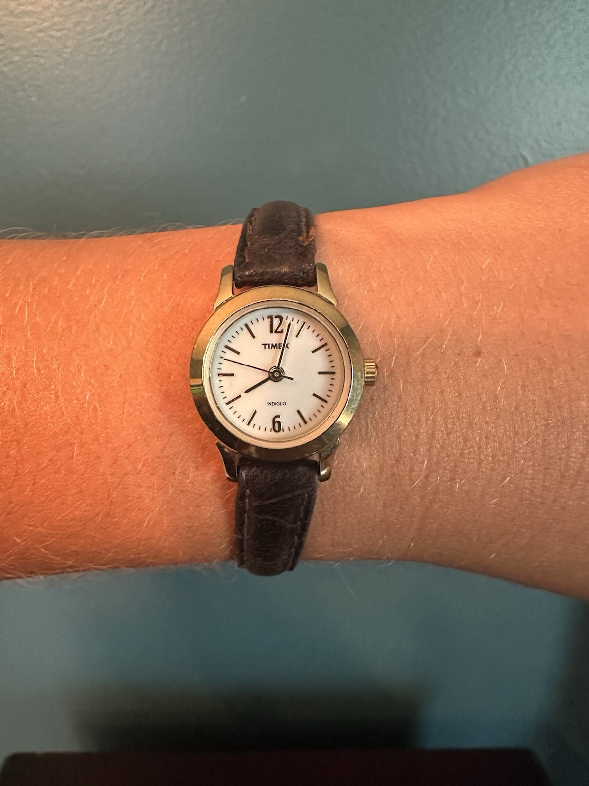 Timex Indiglo Women’s Quartz Analog Watch Gold Case Black Leather Strap 30M