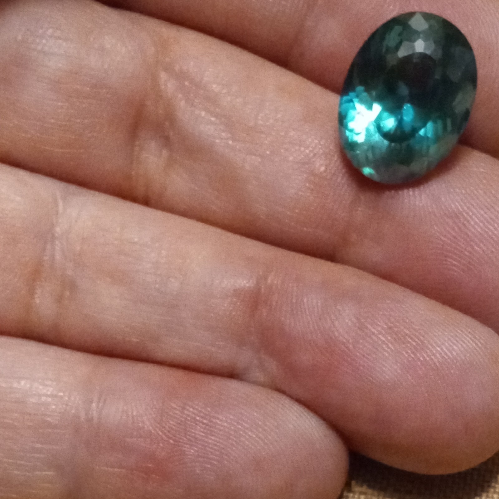 VS 12.98 ct natural green topaz oval shaped coated