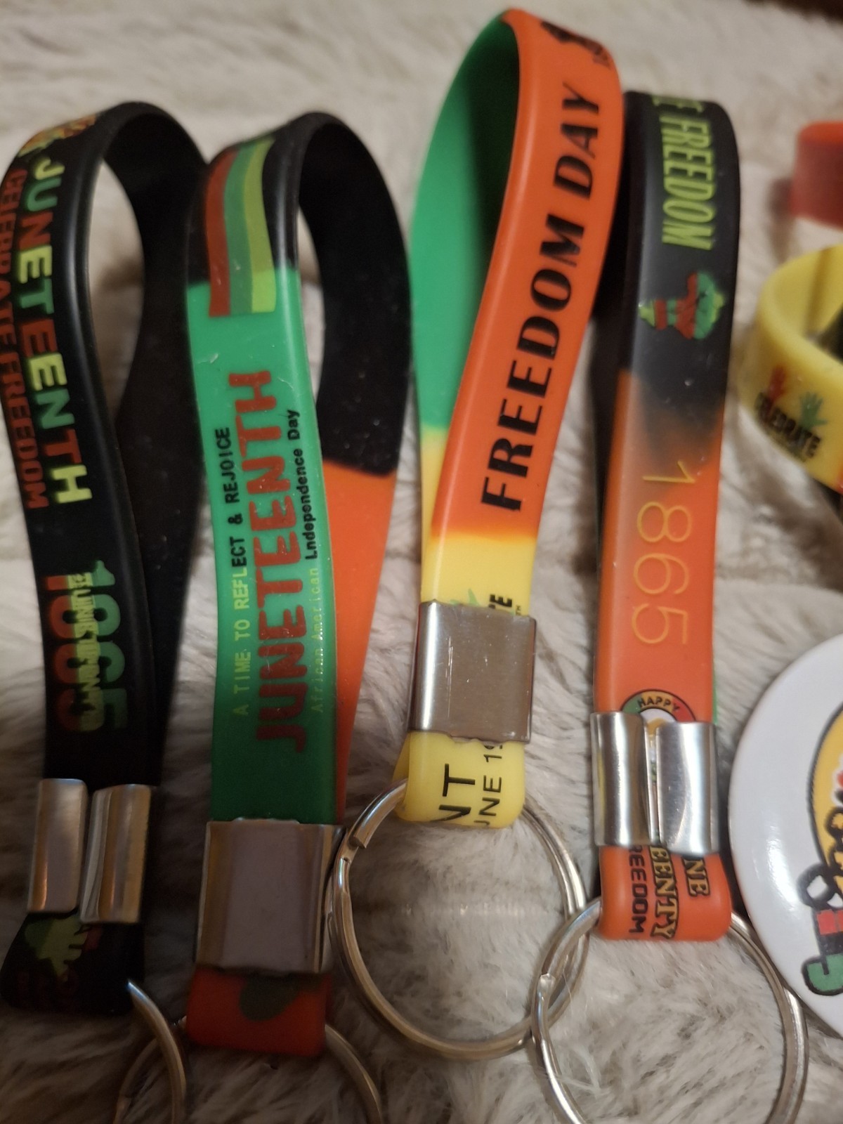 Juneteenth Celebration – 11 Pieces – Pins, Bracelet and Key Rings.