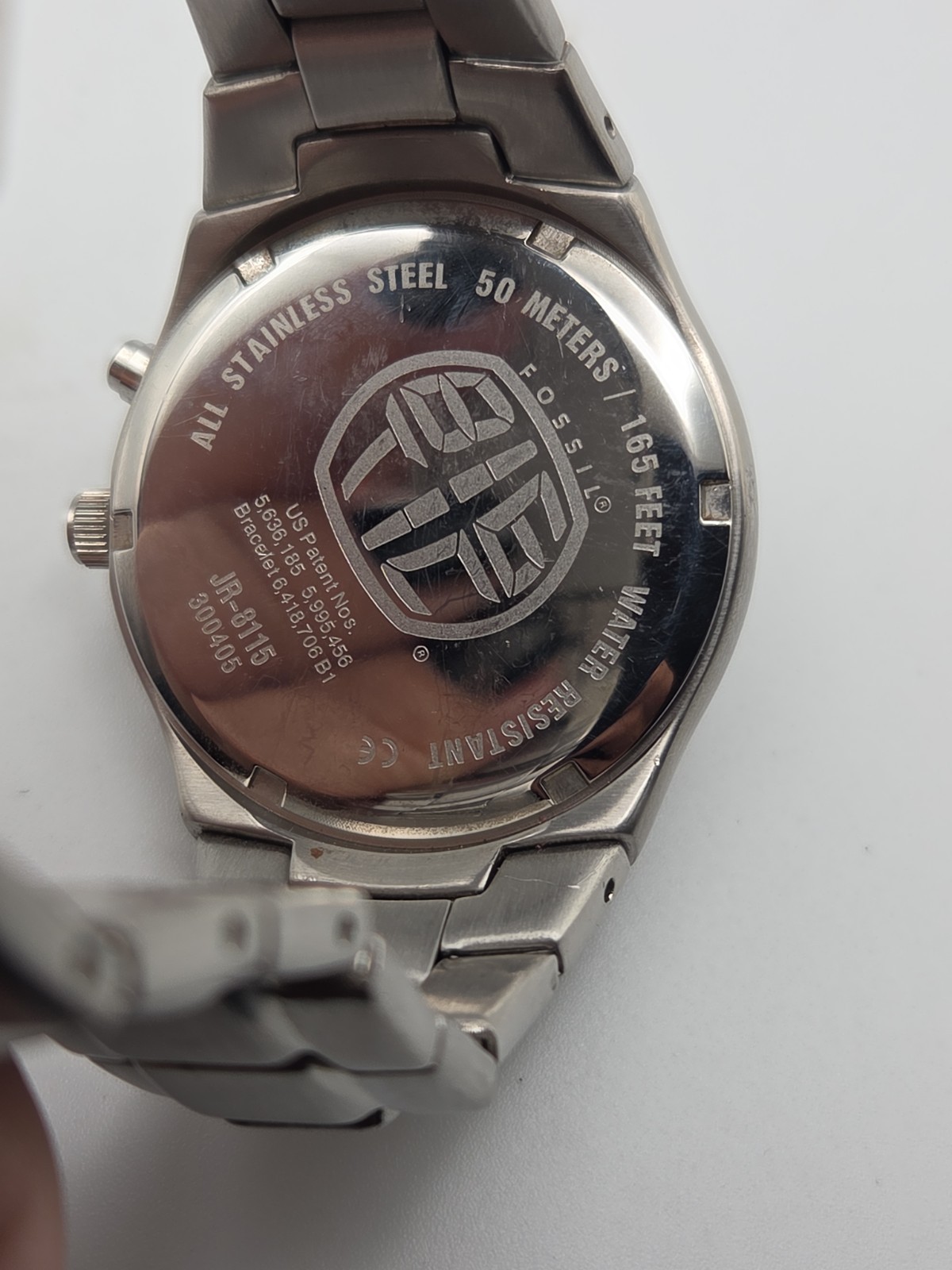 VINTAGE FOSSIL MOVING FLAME STAINLESS STEEL MEN’S WATCH 50 METERS JR-8115