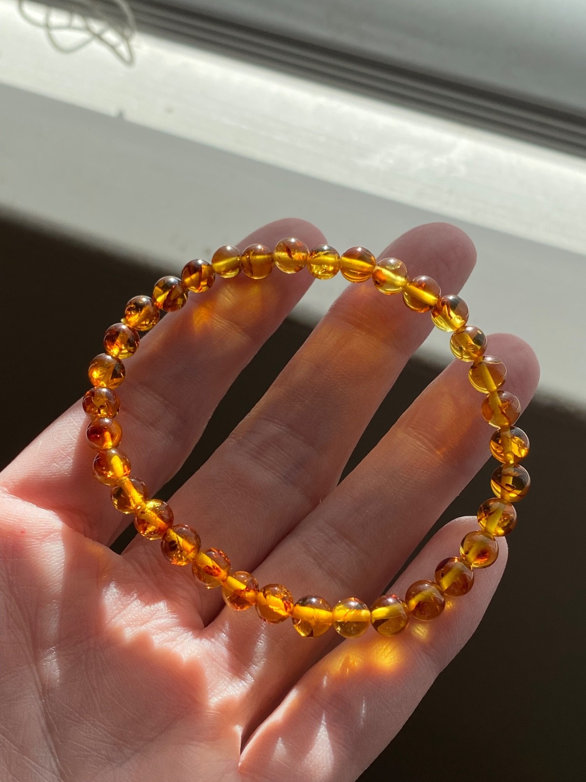 Flower Amber Stretch Bracelet – Approx. 5.8mm Beads – Fits Approximately 7 Inch