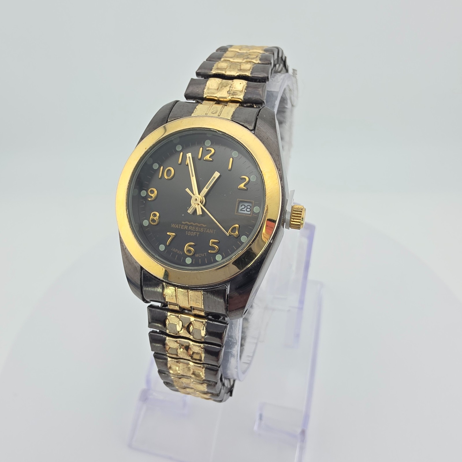 M.Z. BERGER & CO. Ladies Stretch Watch H2O Resistant Black Gold Ion Plated 6.25″