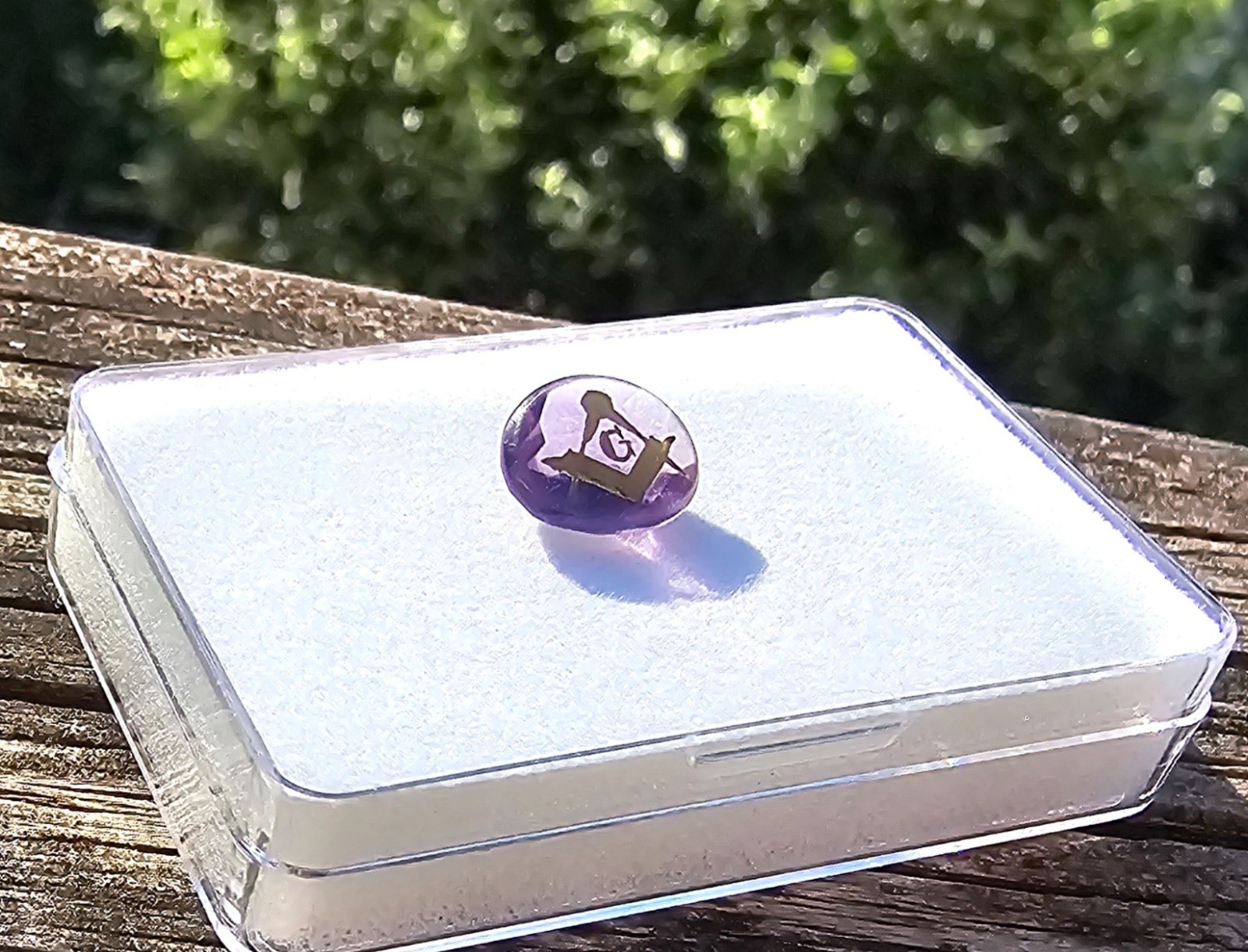 Amethyst 11.4×9.5mm Oval Loose Stone with Mason symbol