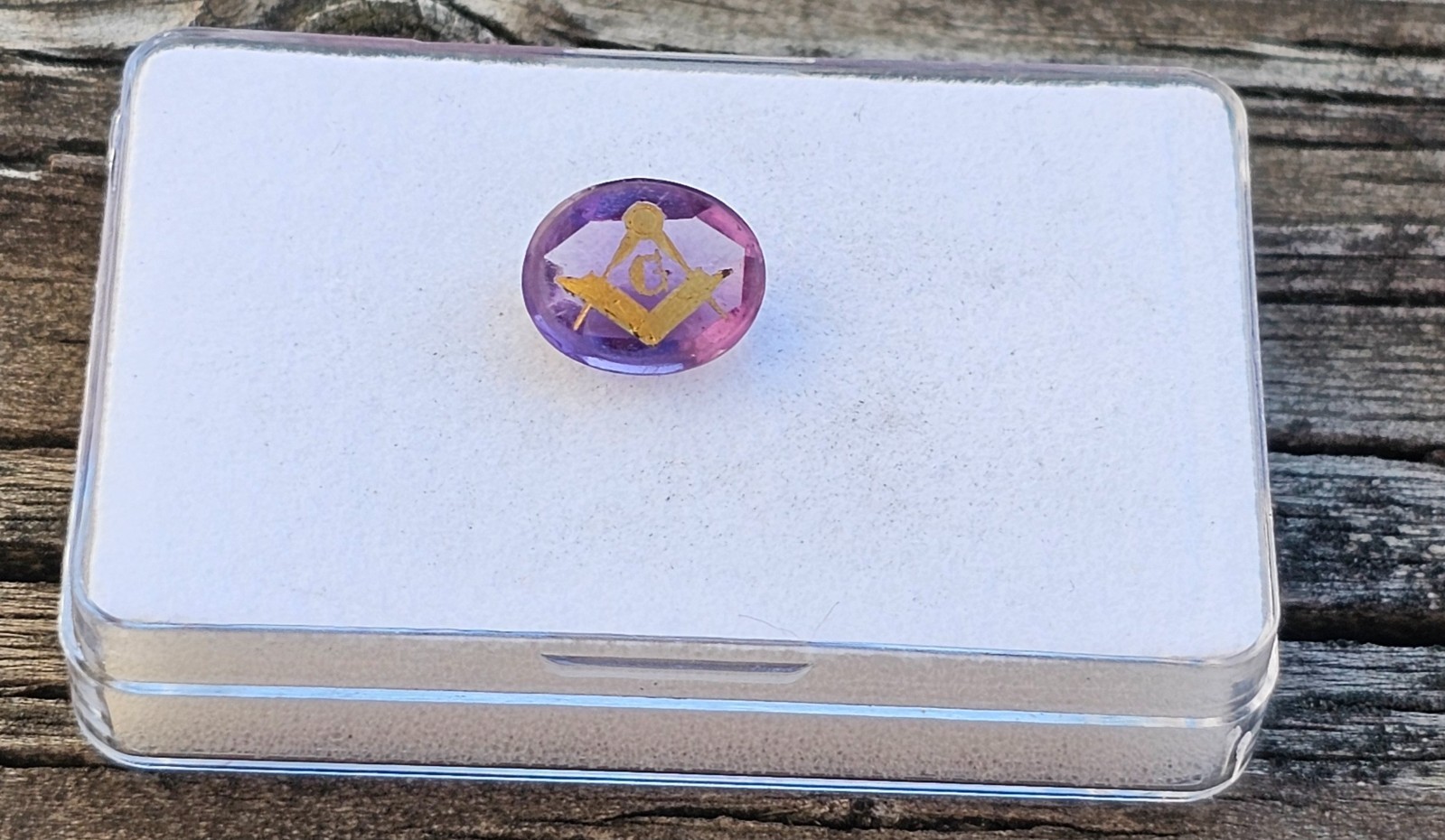 Amethyst 11.4×9.5mm Oval Loose Stone with Mason symbol