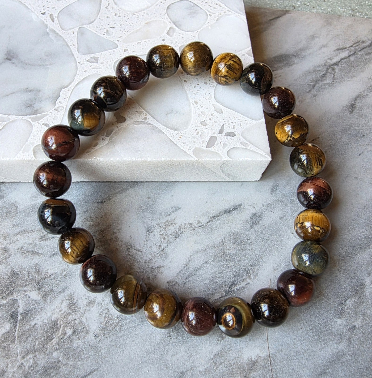 Natural Tiger’s Eye Stretch Bracelet 8-8.5mm Round, 6.50-8.00 Inches 75.0 ctw