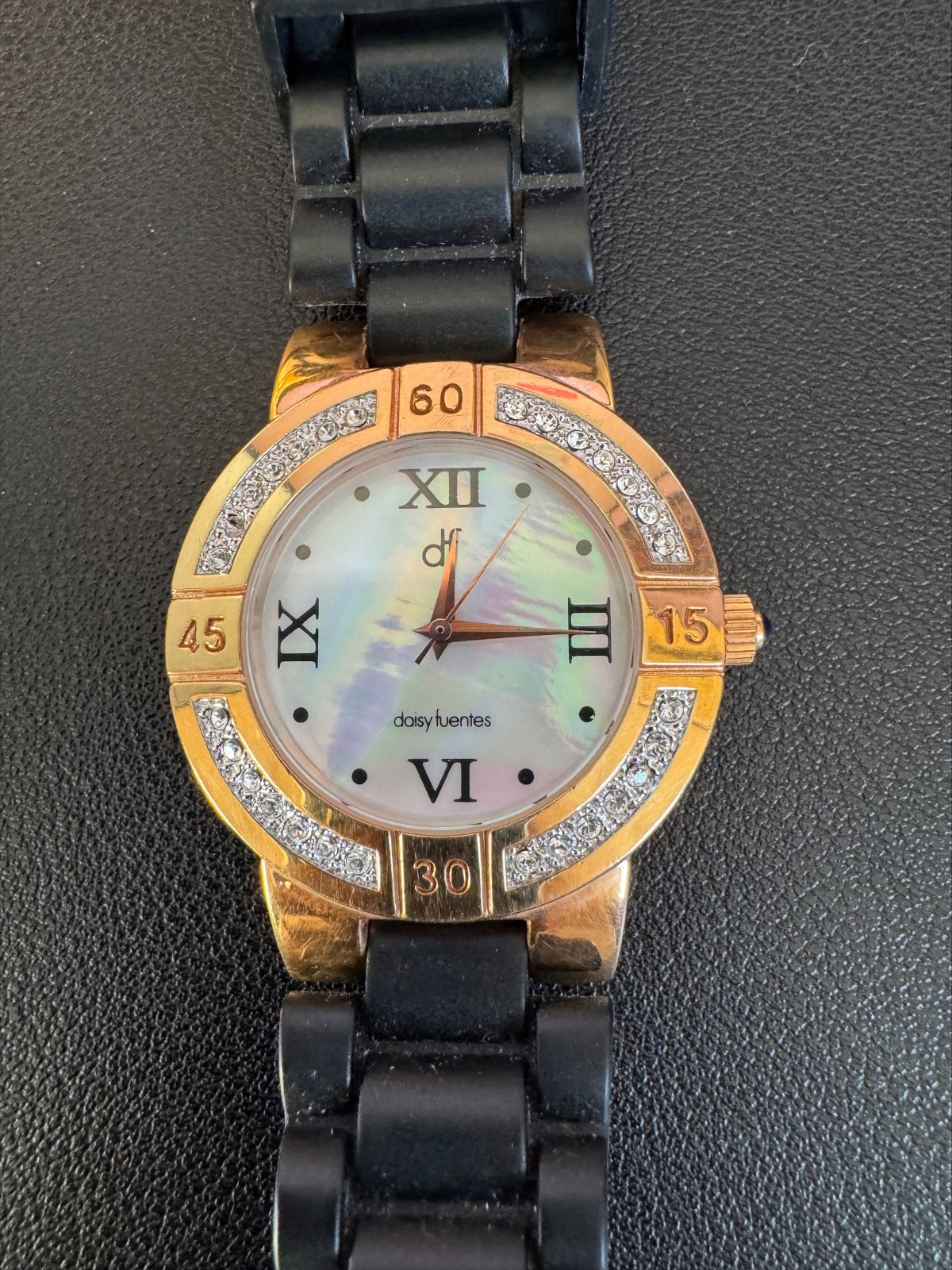Daisy Fuentes Rhinestone Watch MOP Dial Black Strap Women’s Japan Movement