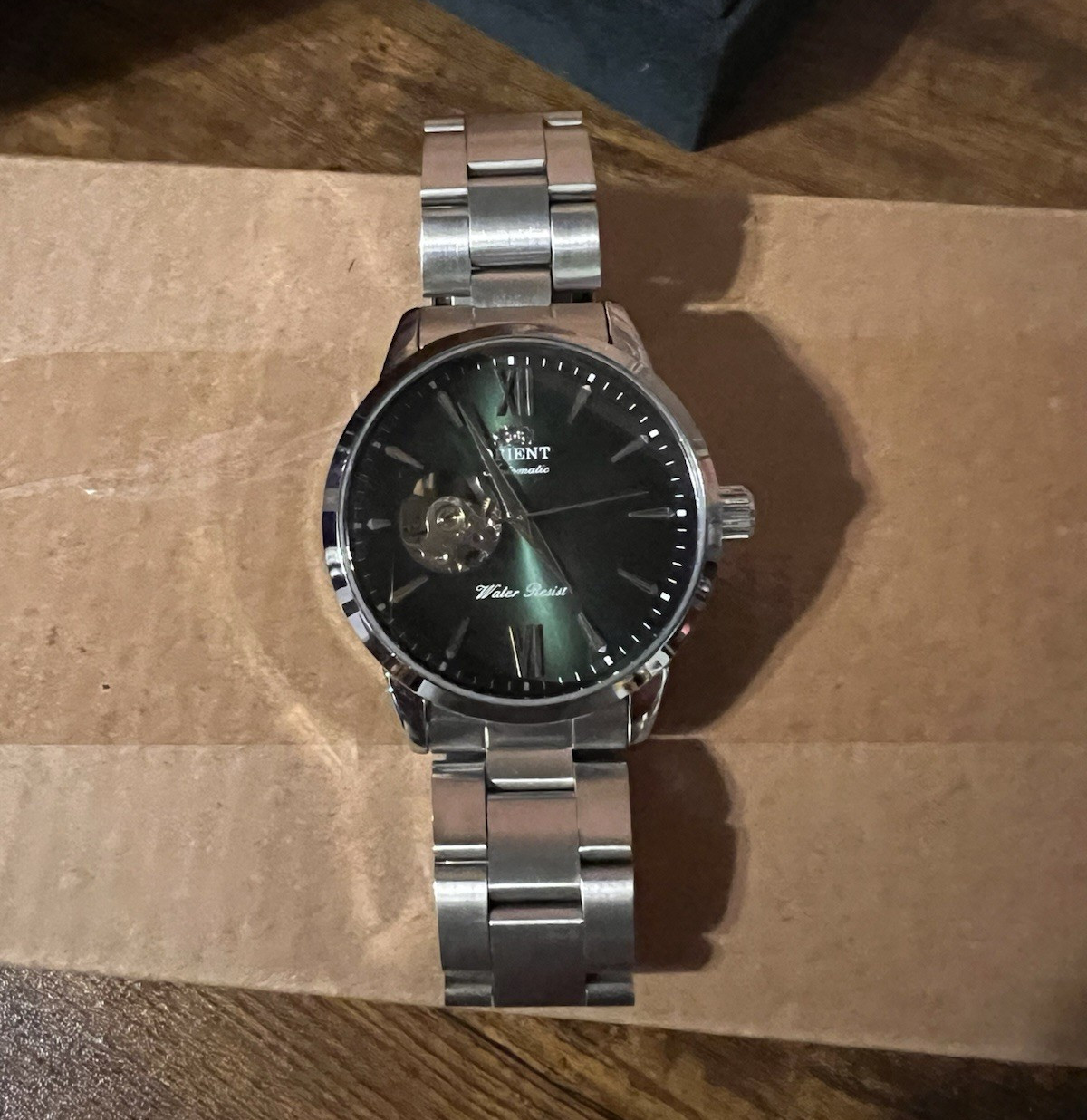Orient Automatic Open Heart Black Dial 40mm SS Bracelet Exhibition Caseback