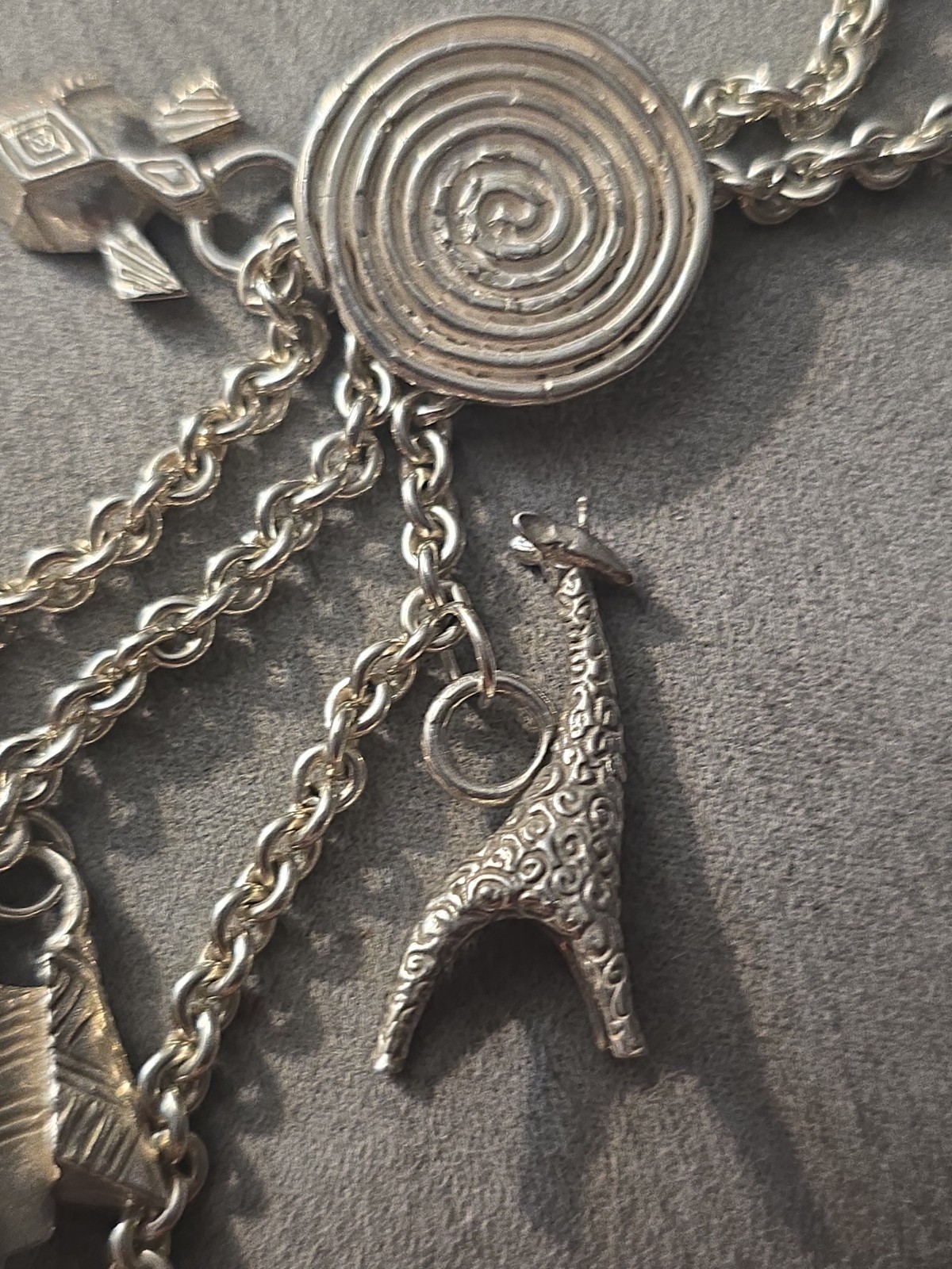 Susan Cummings sterling silver charm necklace African animals abstract tribal
