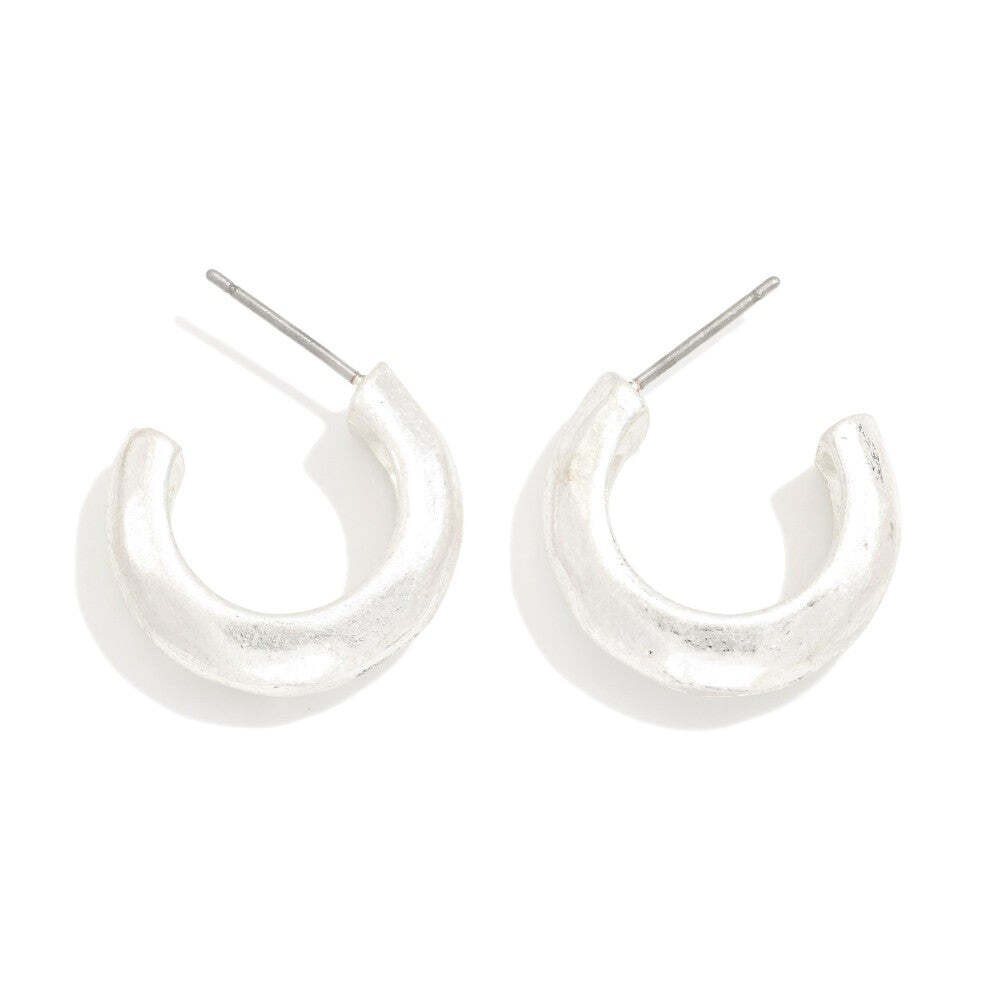 Hammered Metal Hoop Earrings Worn Silver