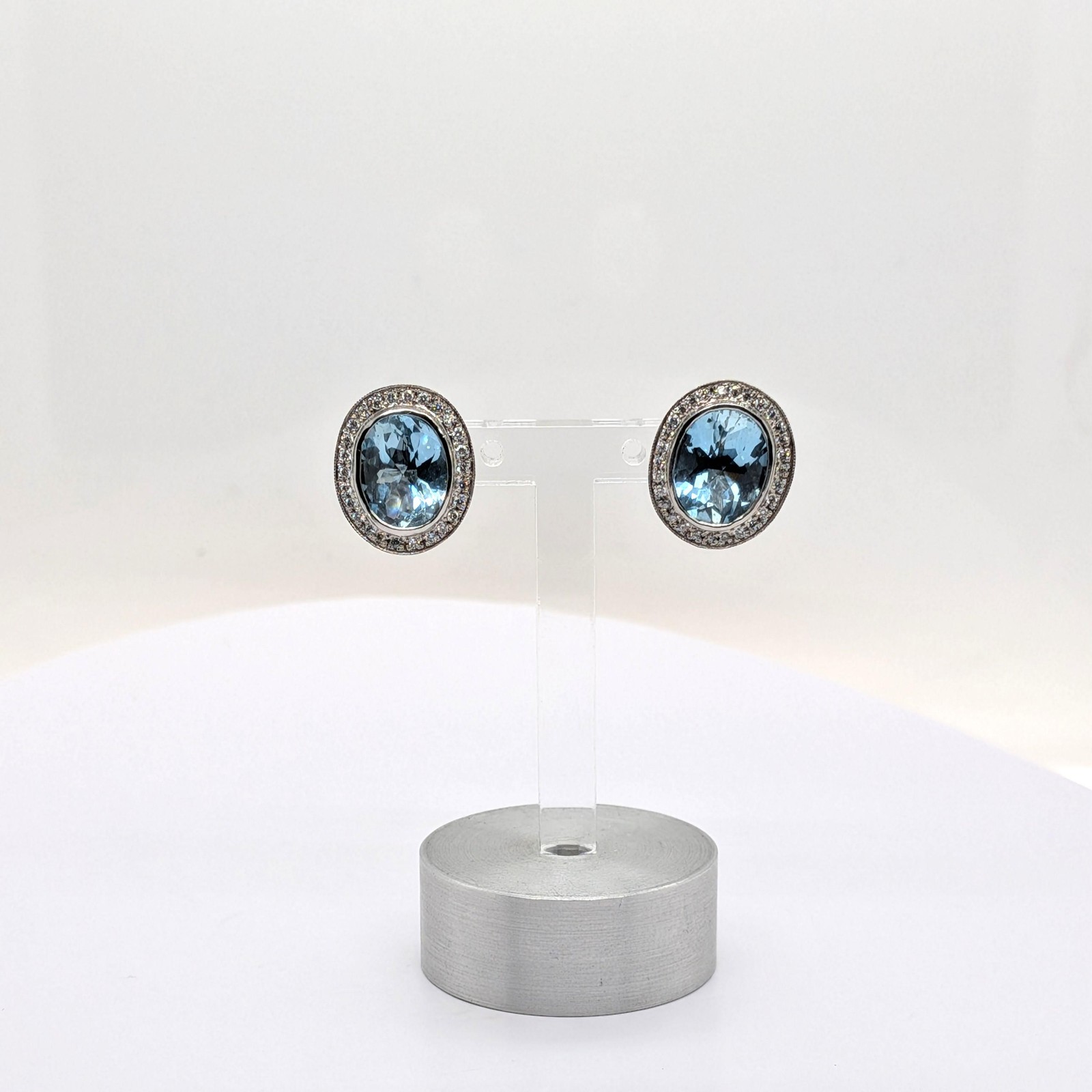 Aquamarine Stud Earrings with a Diamond Halo in 14k White Gold