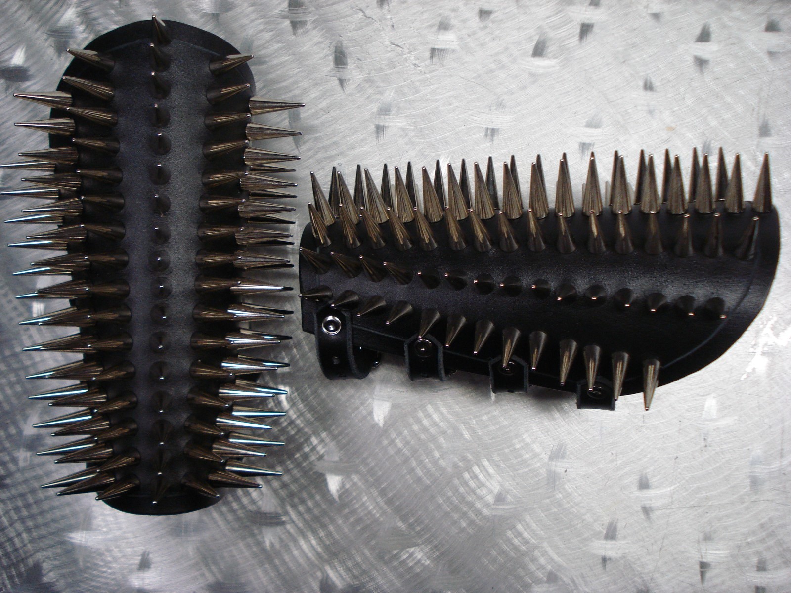 LEATHER SPIKED CONE GAUNTLET. BLACK METAL… (MDLG0231)….. BEHEXEN