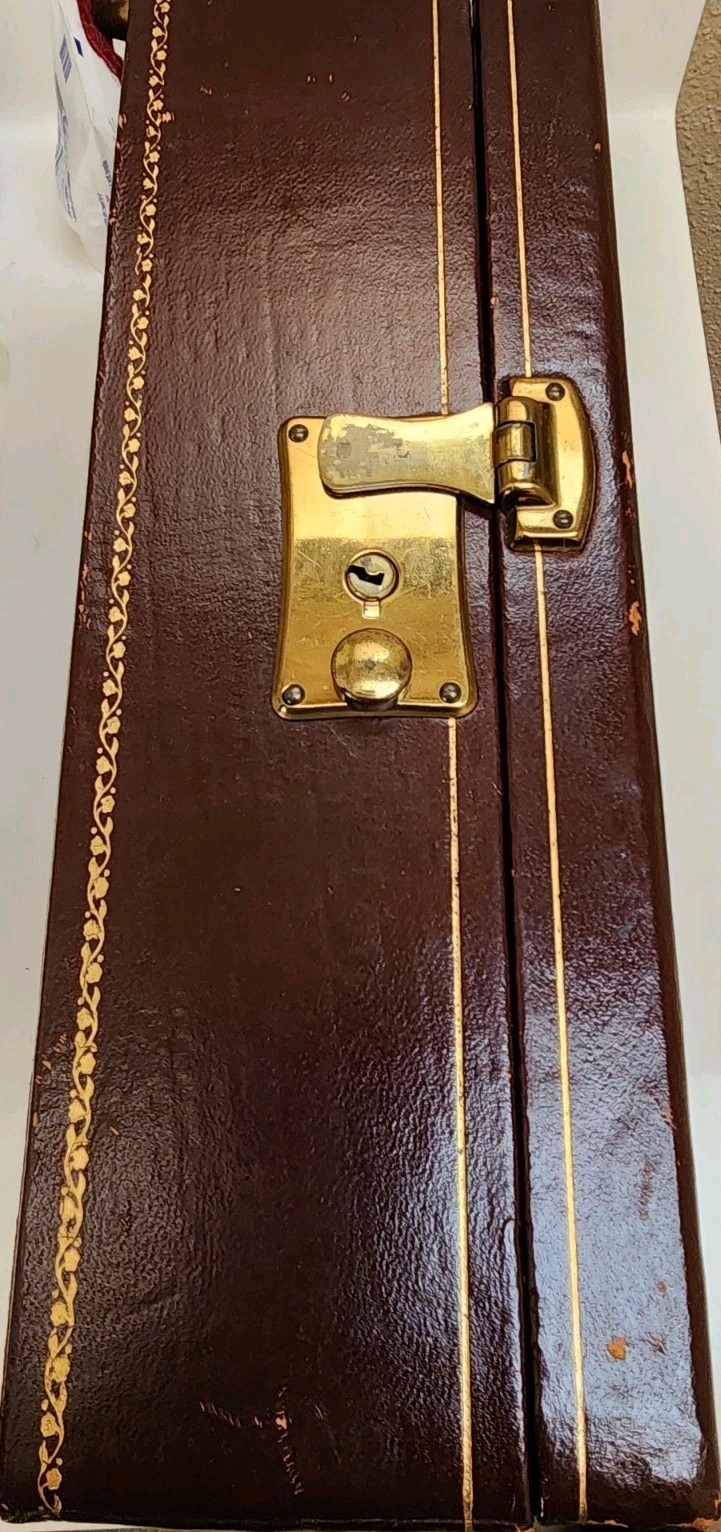 Vtg Switzerland Burgundy/Gold Leather Jewelry Music Box-10.24×7×3.5″ Runs Well
