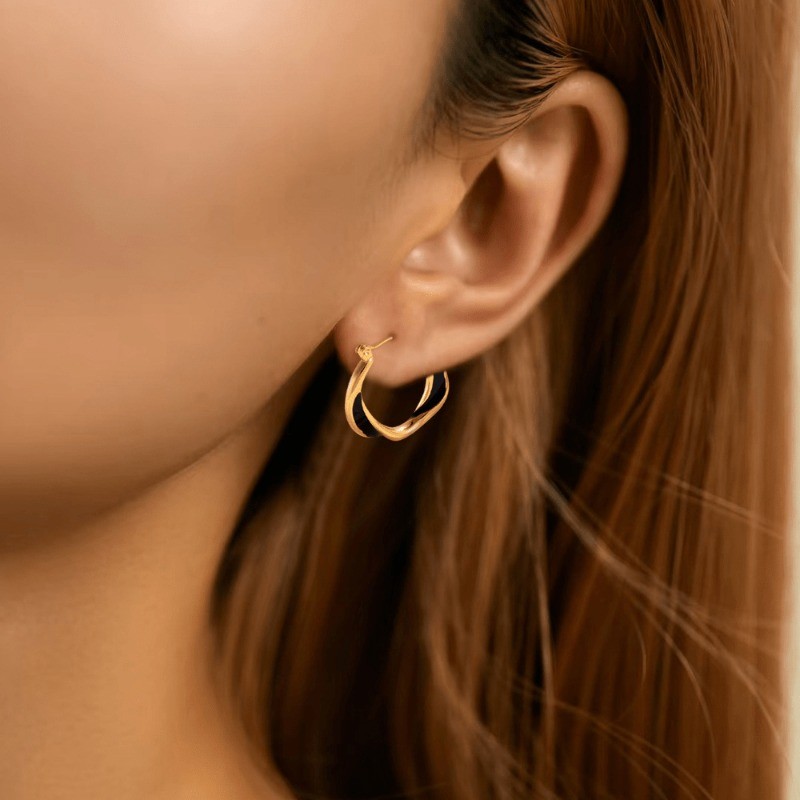 Bohemian Stainless Steel Drip Oil Earrings Women’s Irregular Twisted Ear Buckle