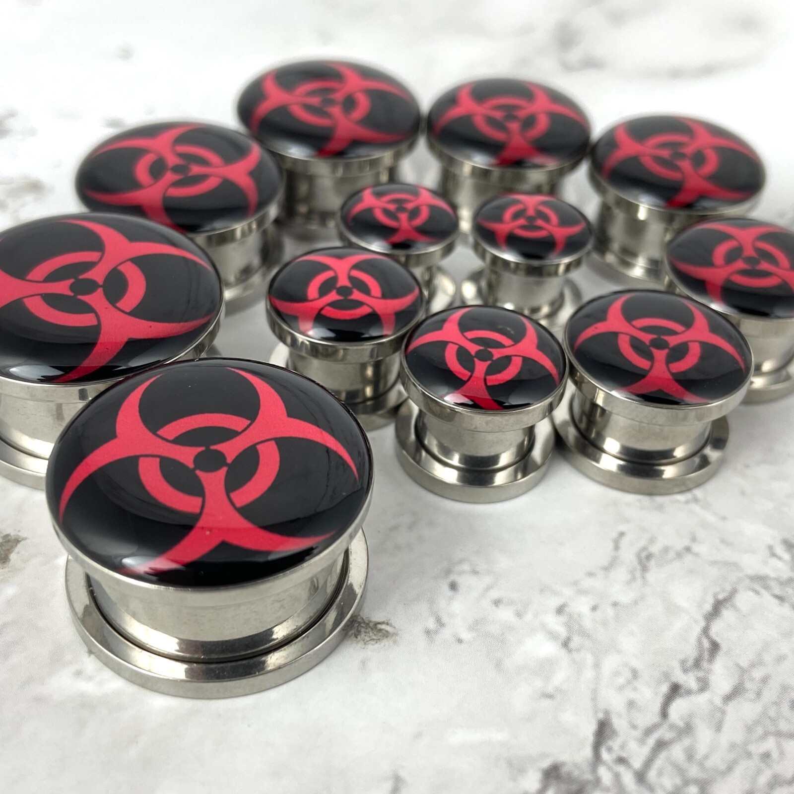 Pair of Screw on Black and Red Biohazard Picture Plugs gauges 16g thru 1 inch