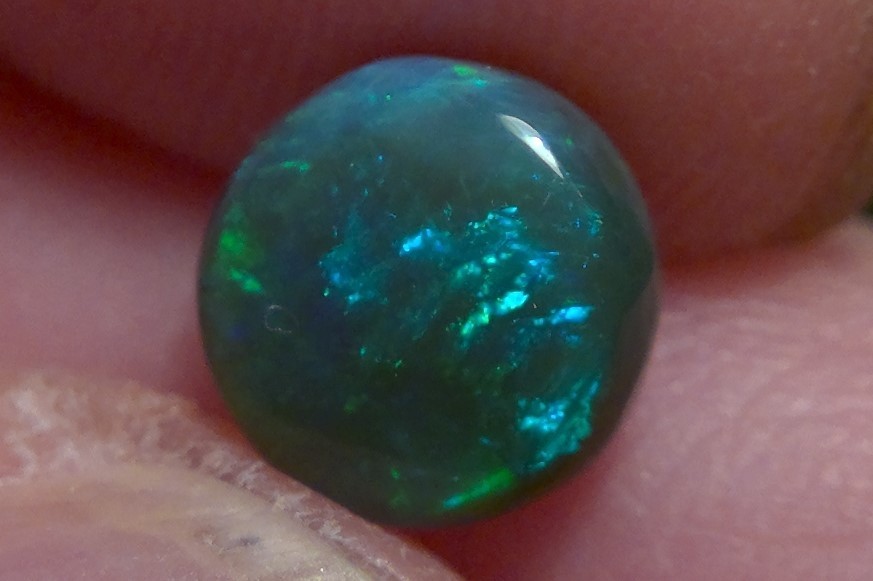 1.25cts solid Lightning Ridge black opal, stunning multicolour *see video*
