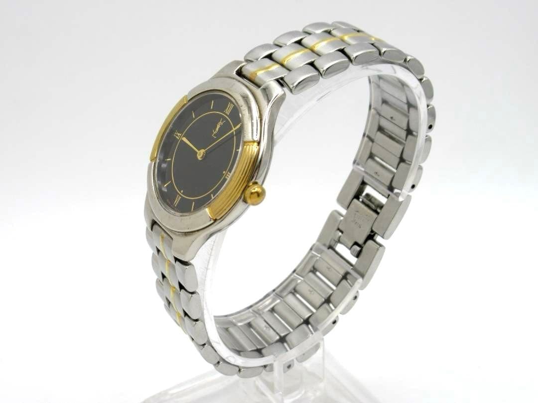 Yves Saint Laurent watch 4620-E66661Y, black dial, working condition.