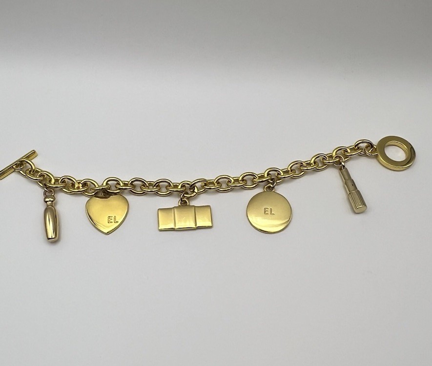 Vintage ESTEE LAUDER Runway Gold Tone Charm Bracelet Couture 7.5 ”