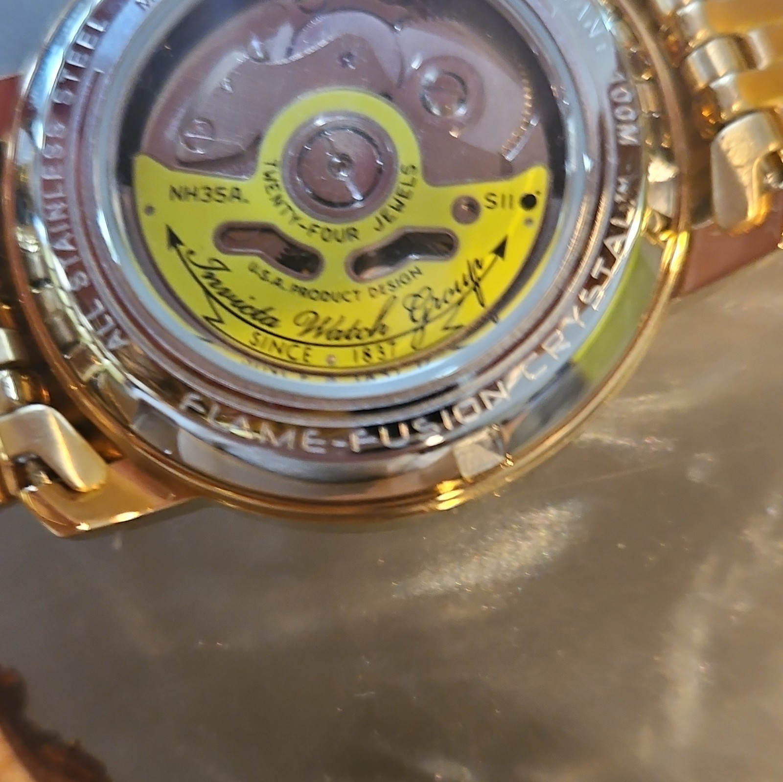 Invicta Flame Fusion Automatic Men’s Gold Tone Bracelet Silver Dial Open Heart