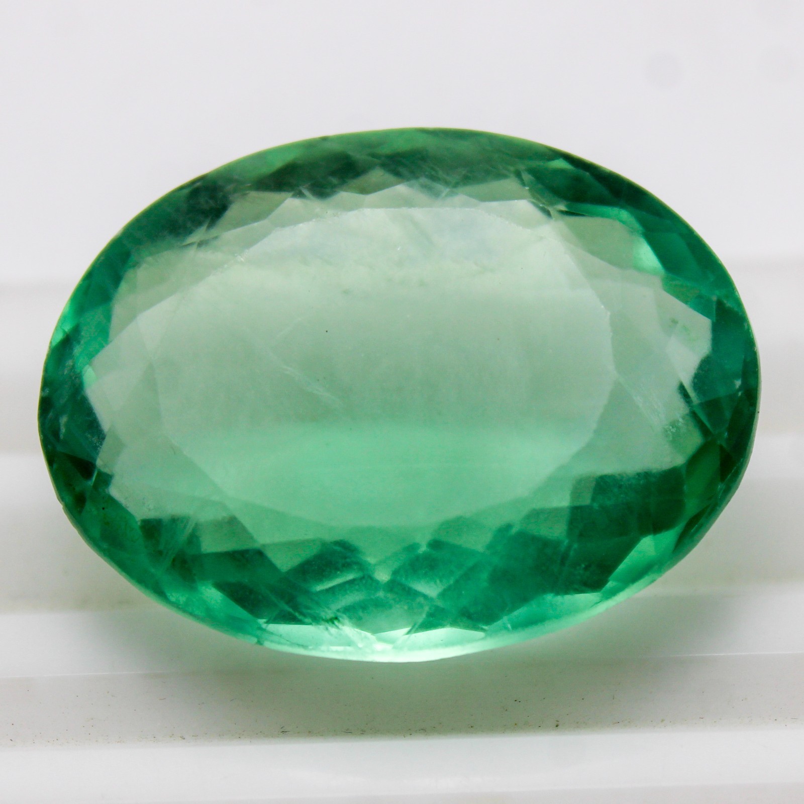 Natural Green Fluorite Faceted In Oval Shape, 110.45 Carats, 35x26x15 mm Size