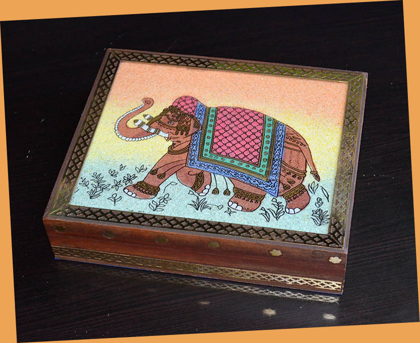 Wooden jewelry box with glass gem stone painting and brass border from India!