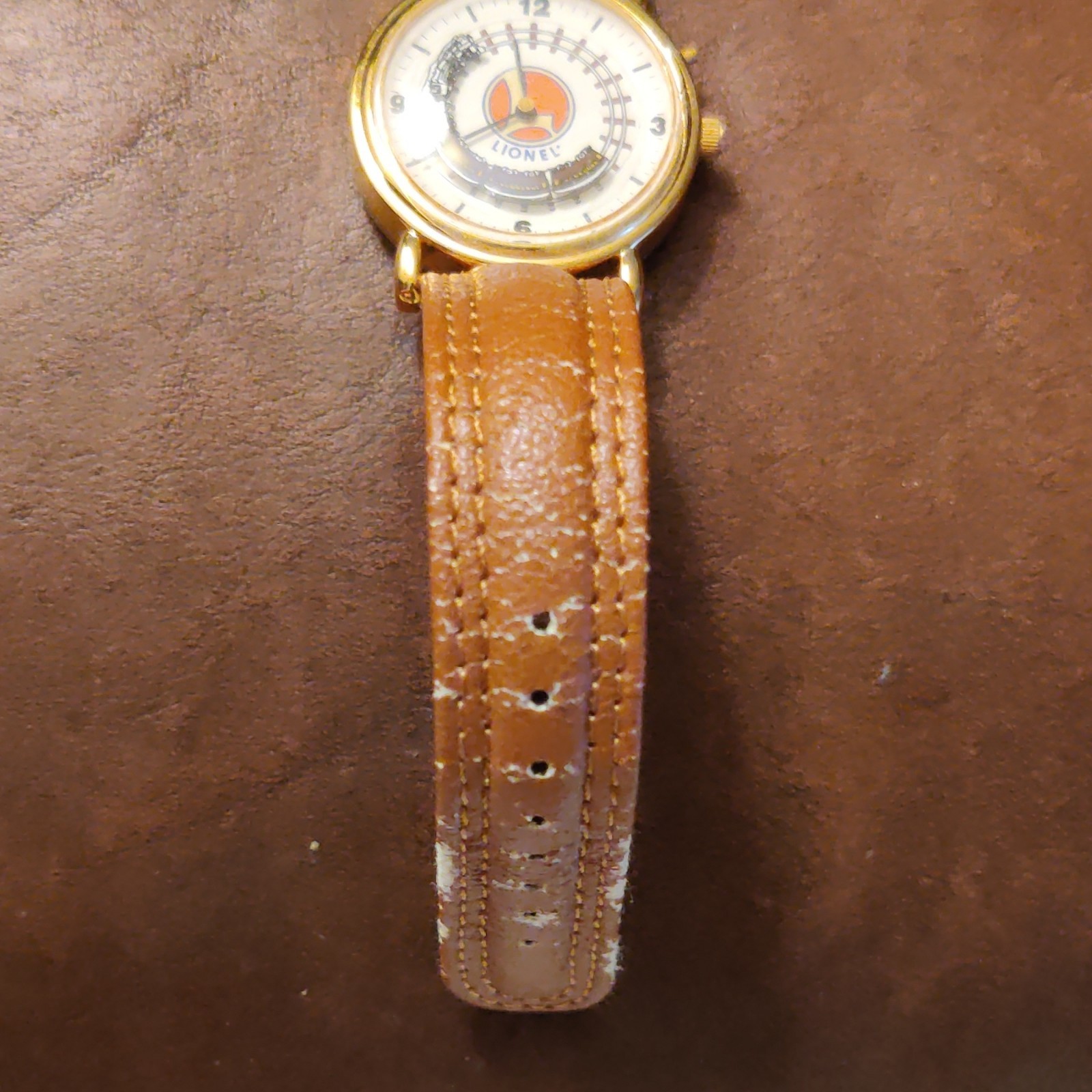 Lionel Train Theme Quartz Analog Watch Gold Tone Case Brown Leather Strap Tin