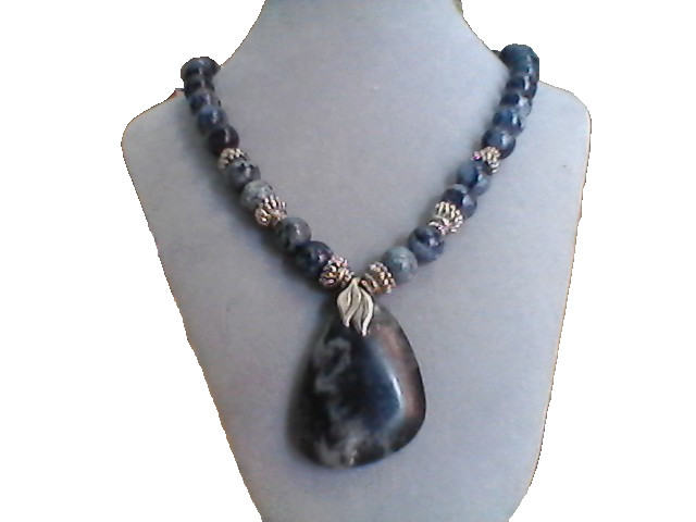 18″ 10mm sodallite beads and pendant with sterling silver clasp