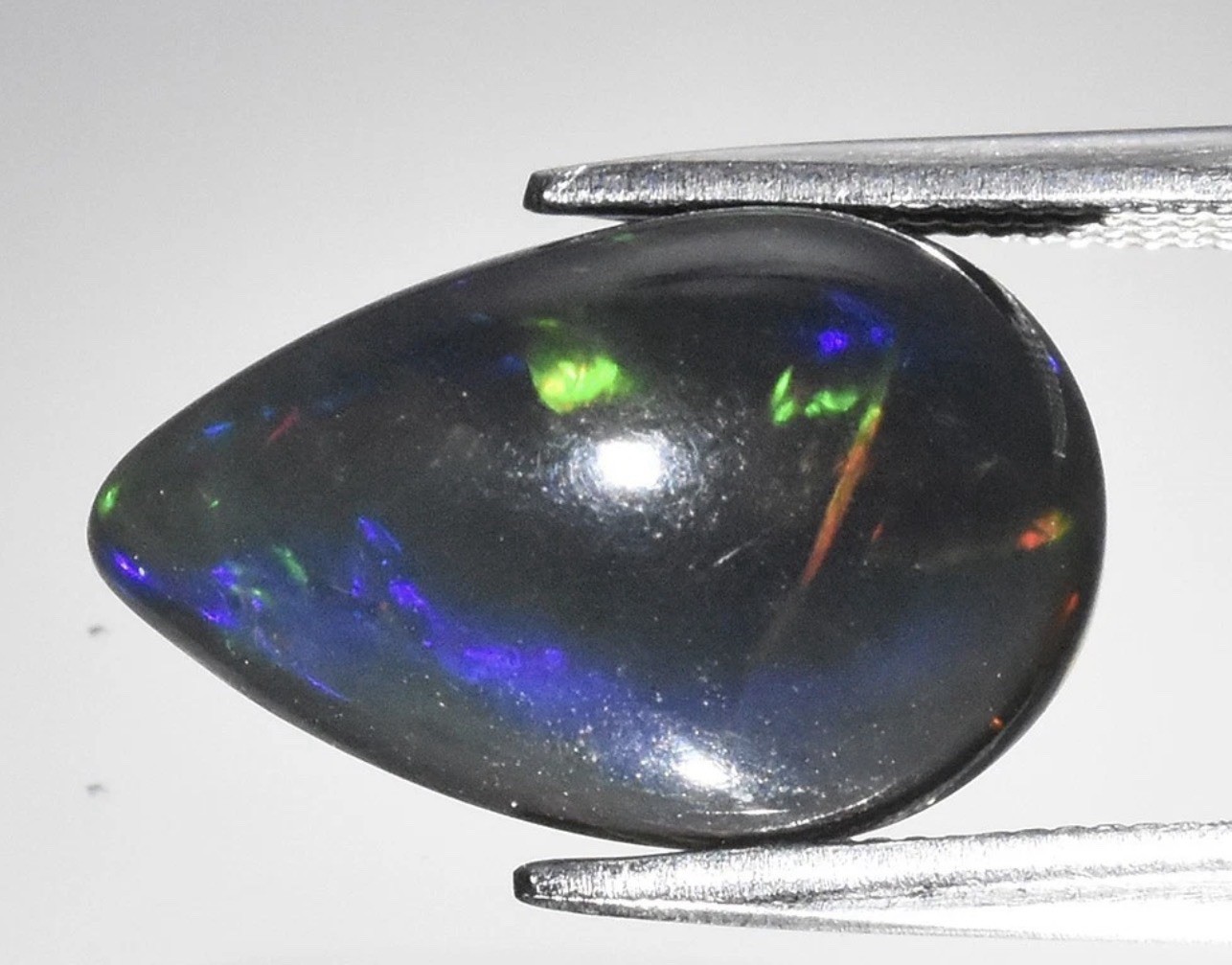 💎 2.96ct 13.3×8.5mm Pear Cabochon Smoked Welo Opal -Rainbow Flash,l