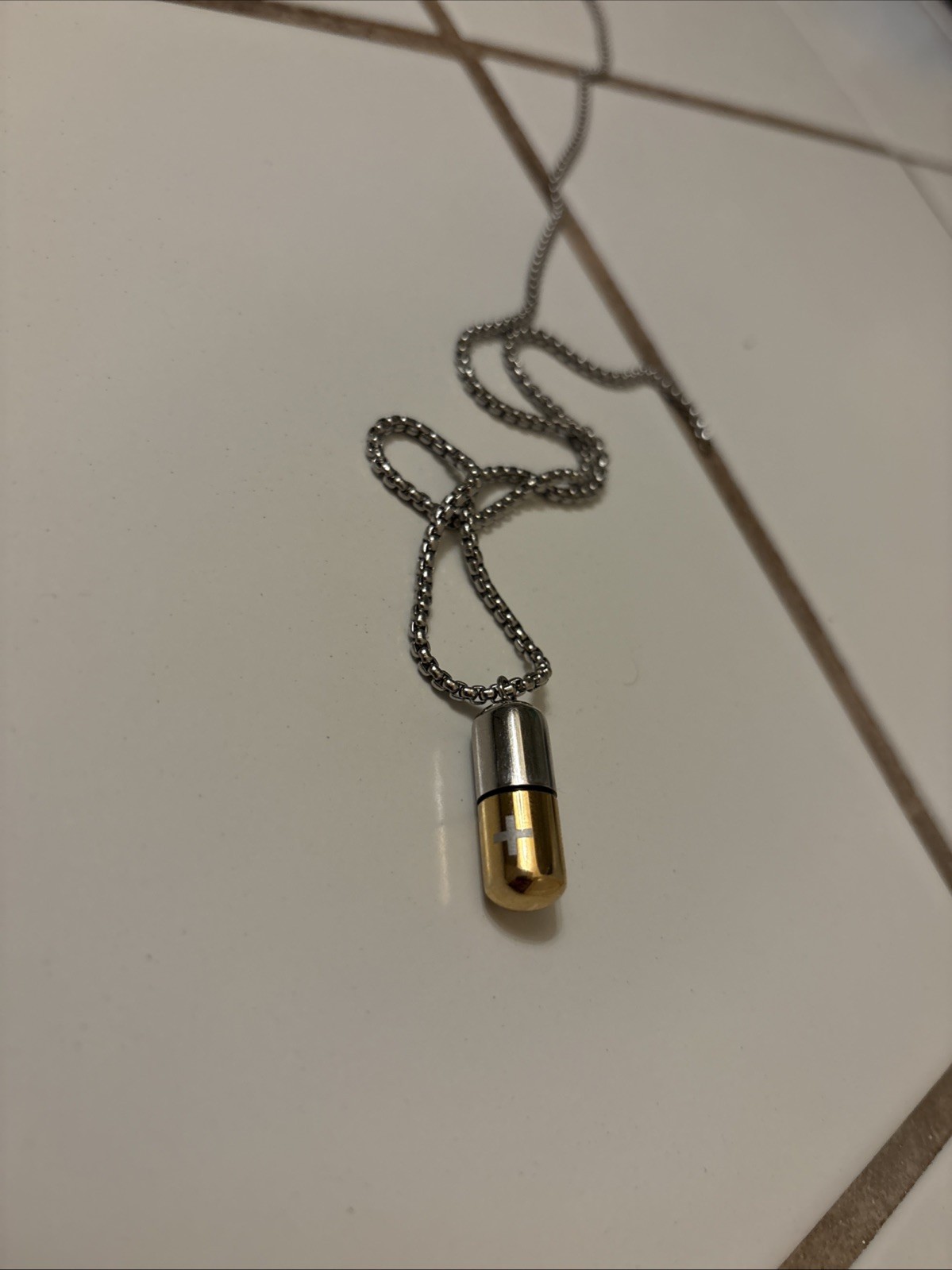 Capsule pendant necklace