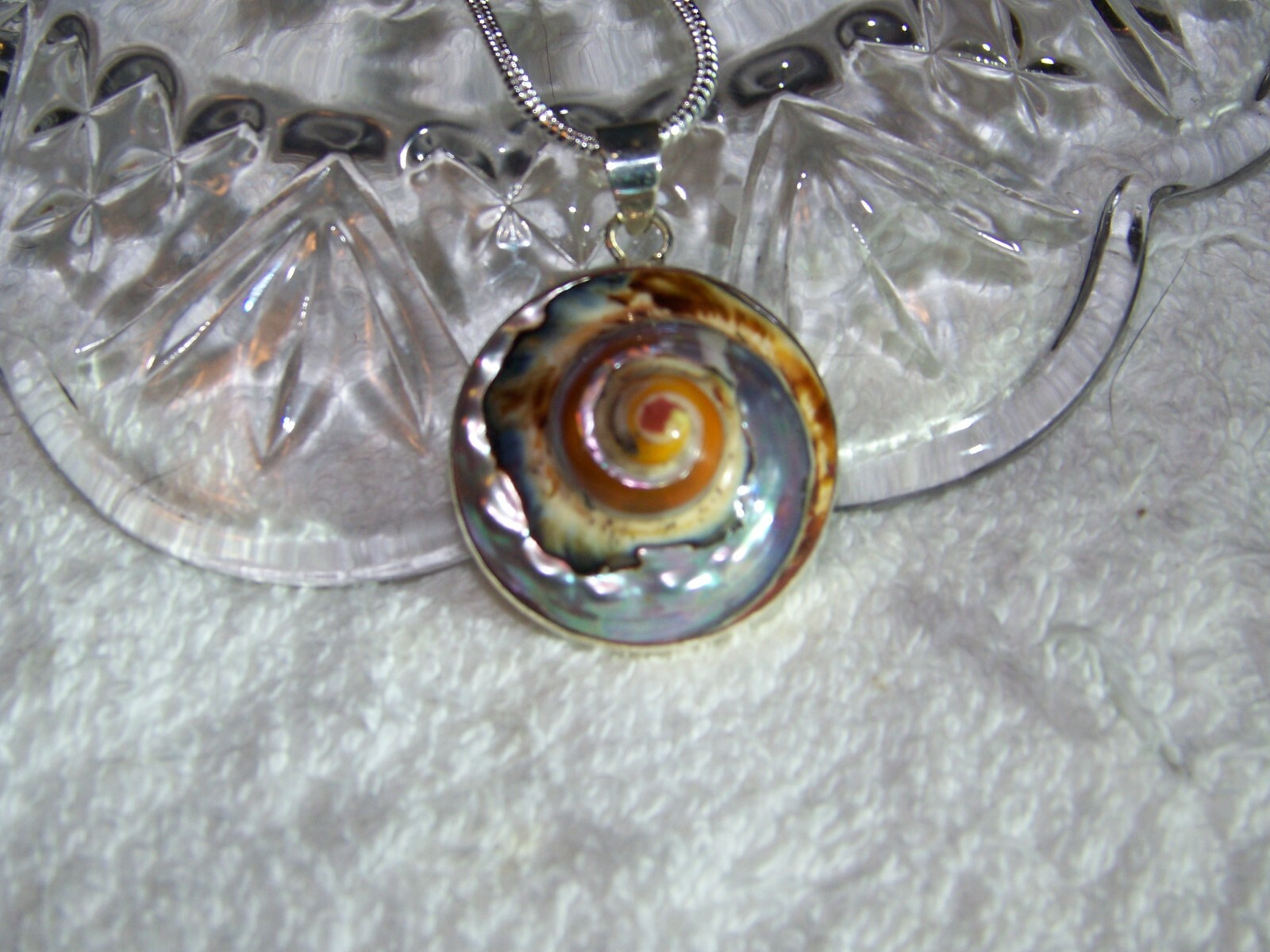 Sterling Silver African Turban shell on 2mm 16-30 inch sterling necklace.